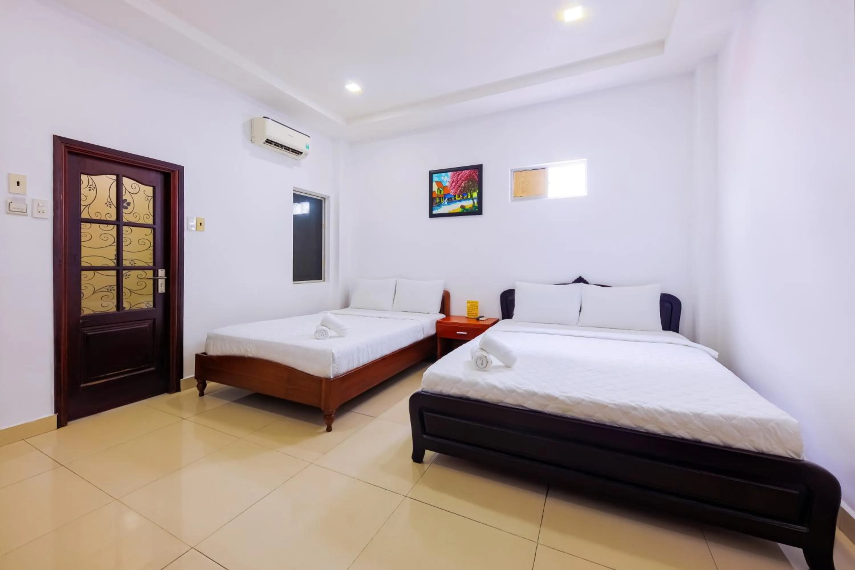 Bed in Mangolia Hotel