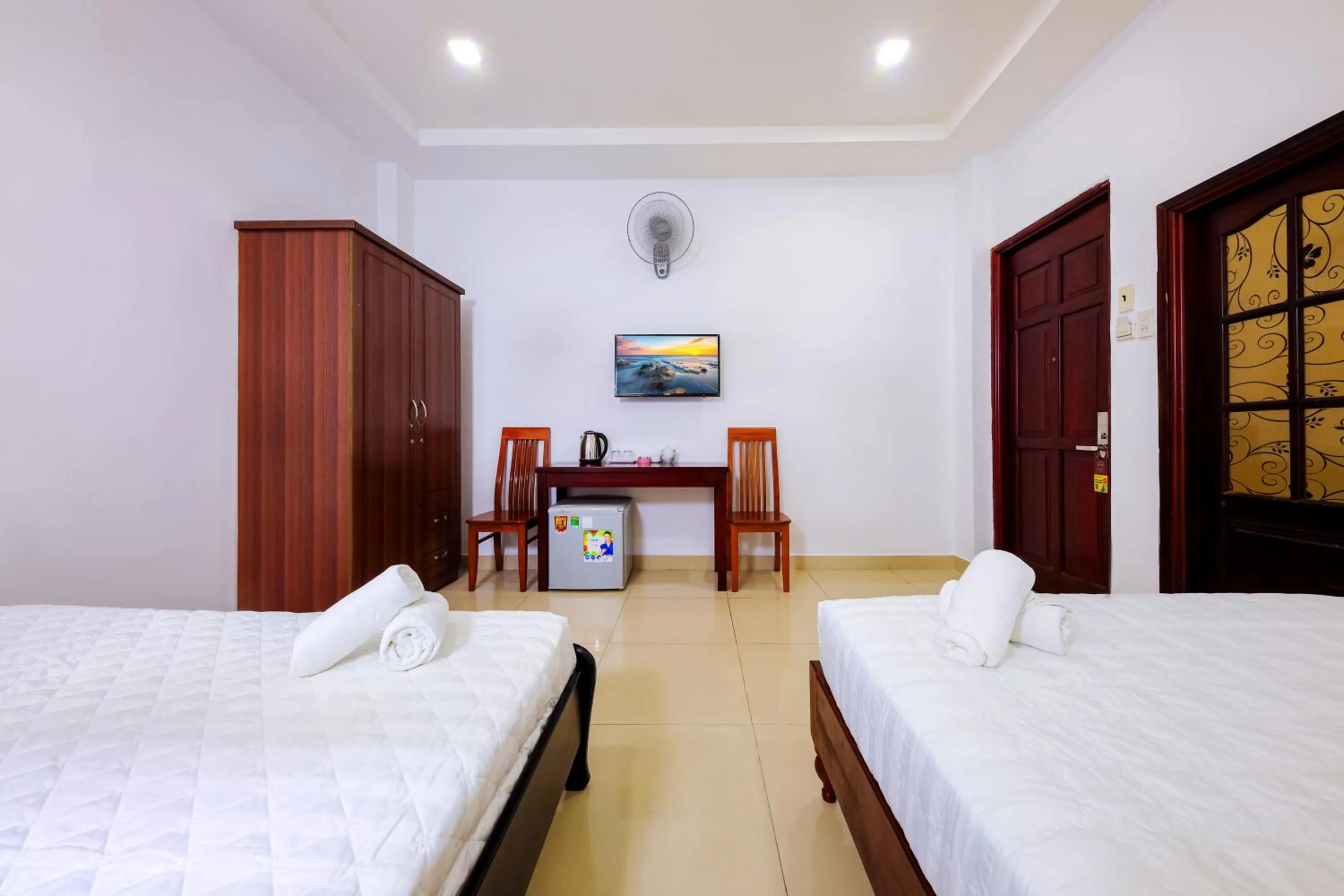Bed in Mangolia Hotel