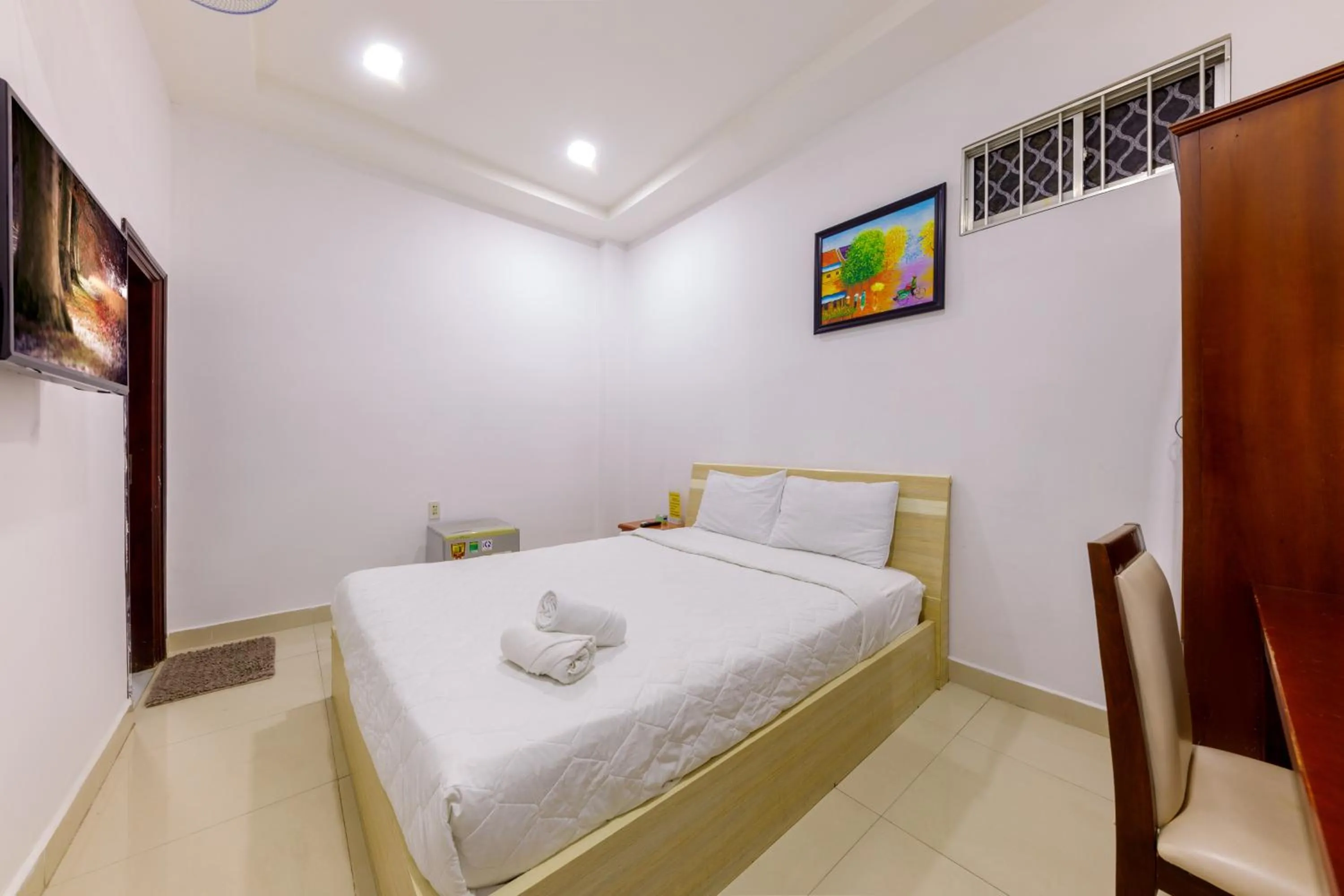 Bed in Mangolia Hotel