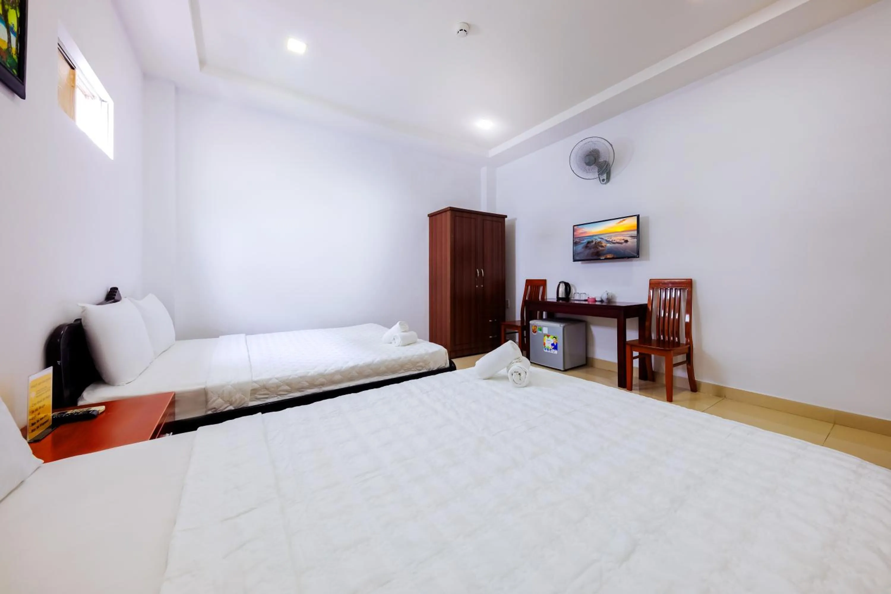 Bed in Mangolia Hotel