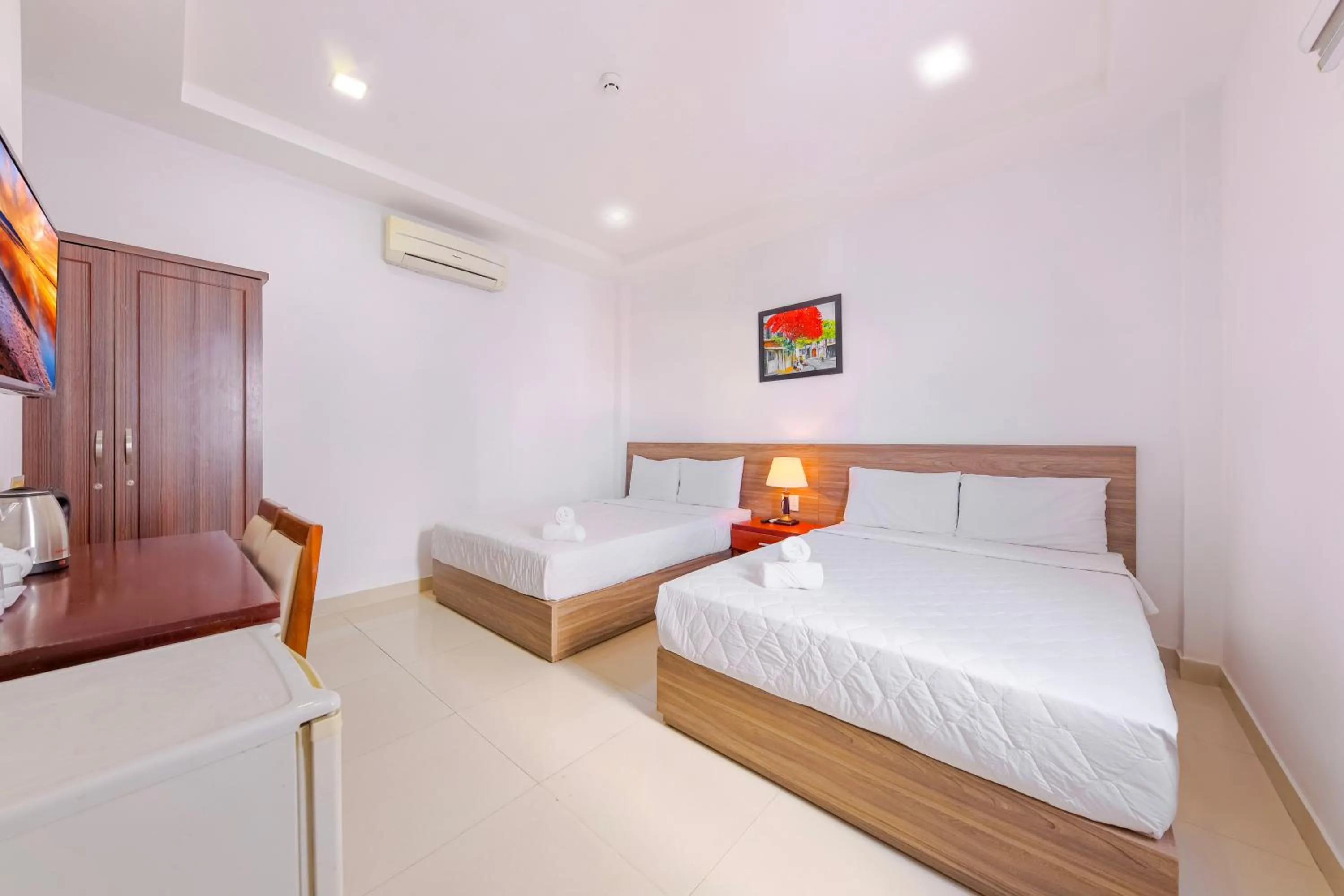 Bed in Mangolia Hotel