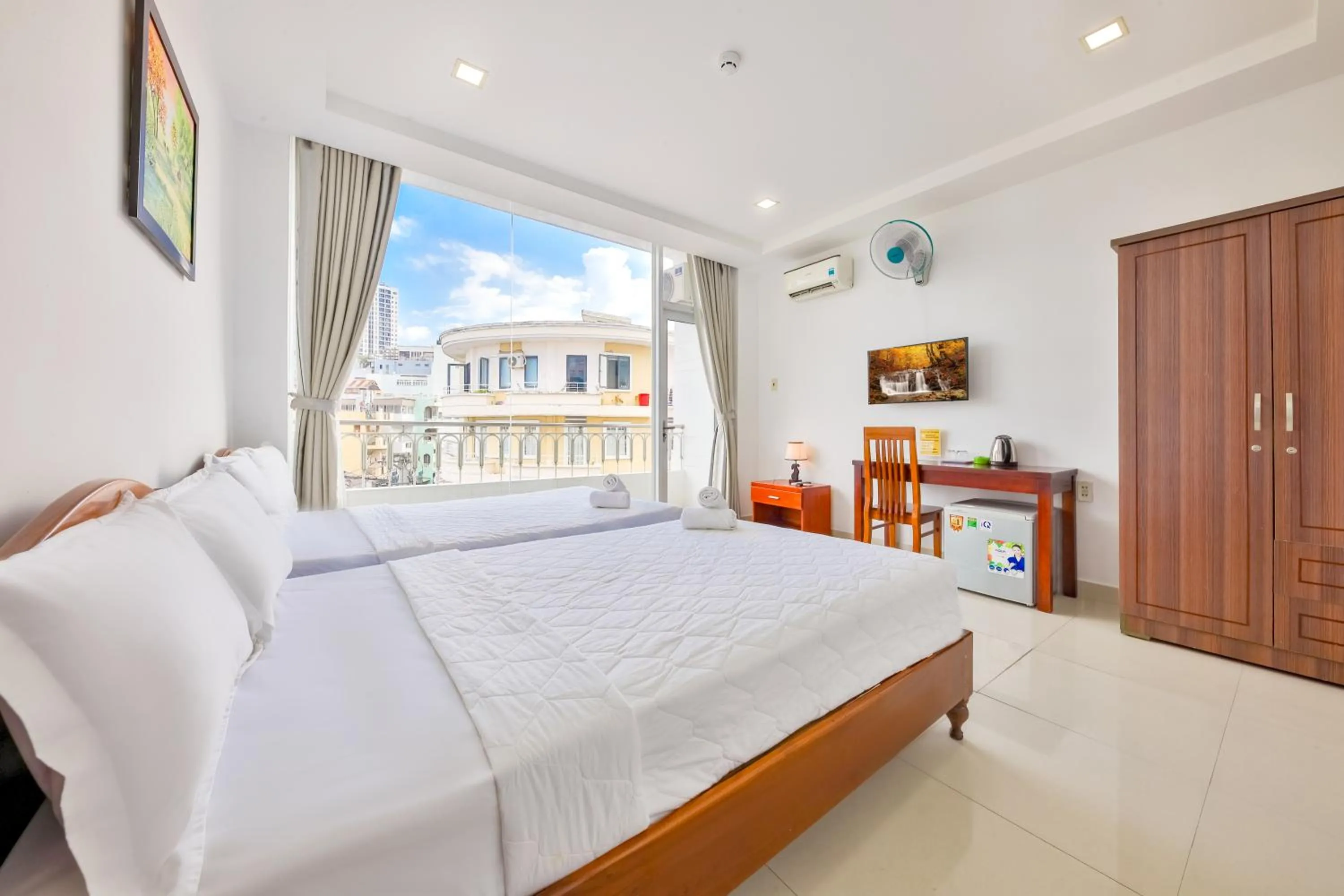 Bed in Mangolia Hotel