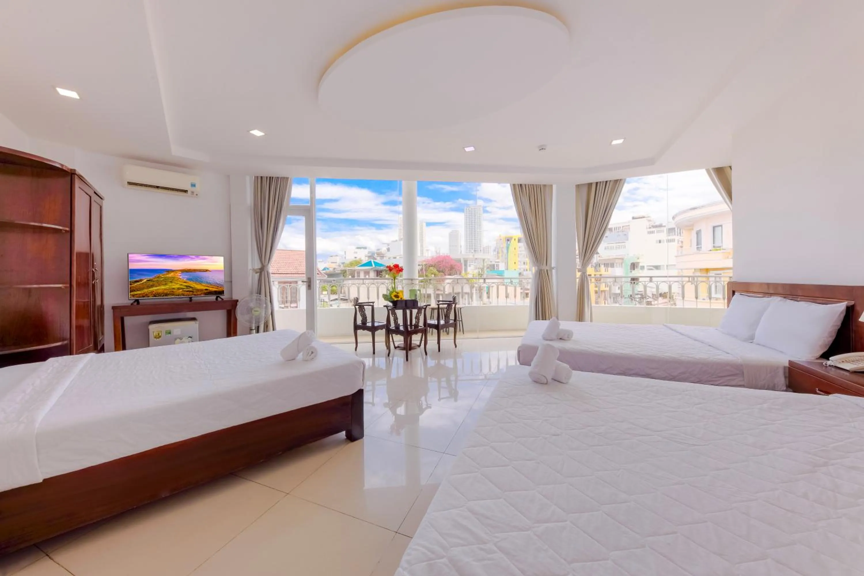 Bed in Mangolia Hotel