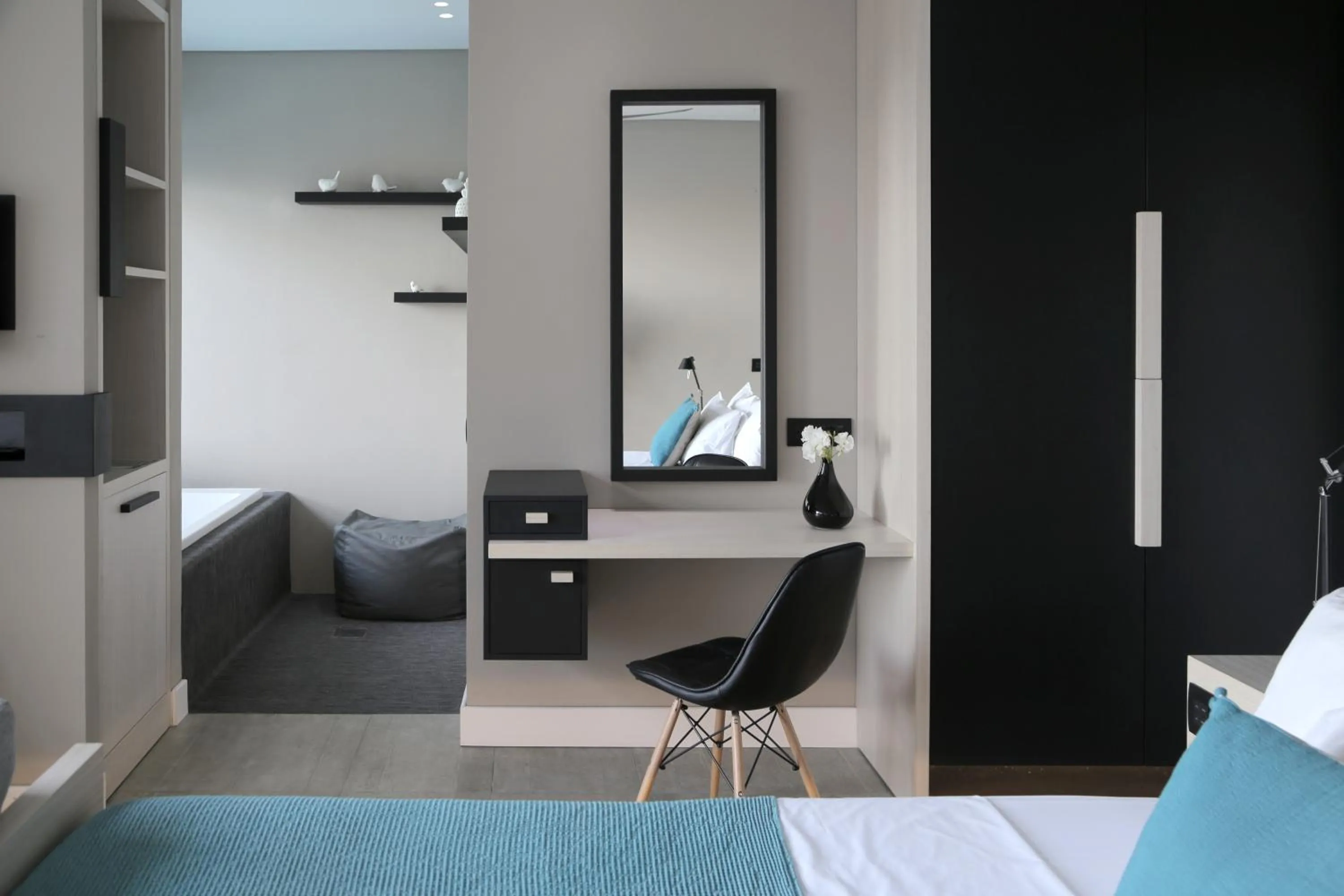 Seating area, Bed in Domes Aulus Elounda, Adults only, Curio Collection by Hilton