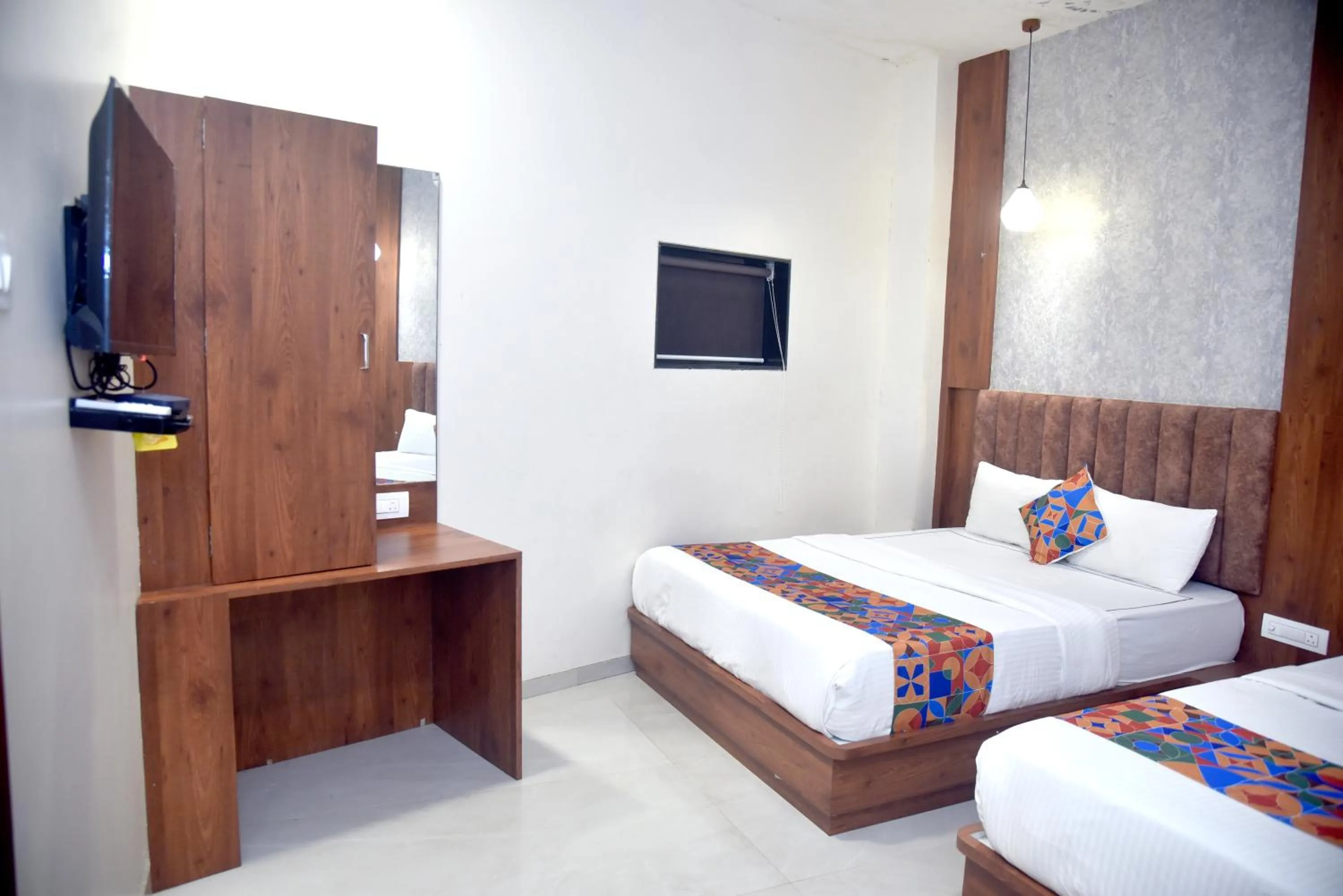 Bedroom in Hotel Pride Inn