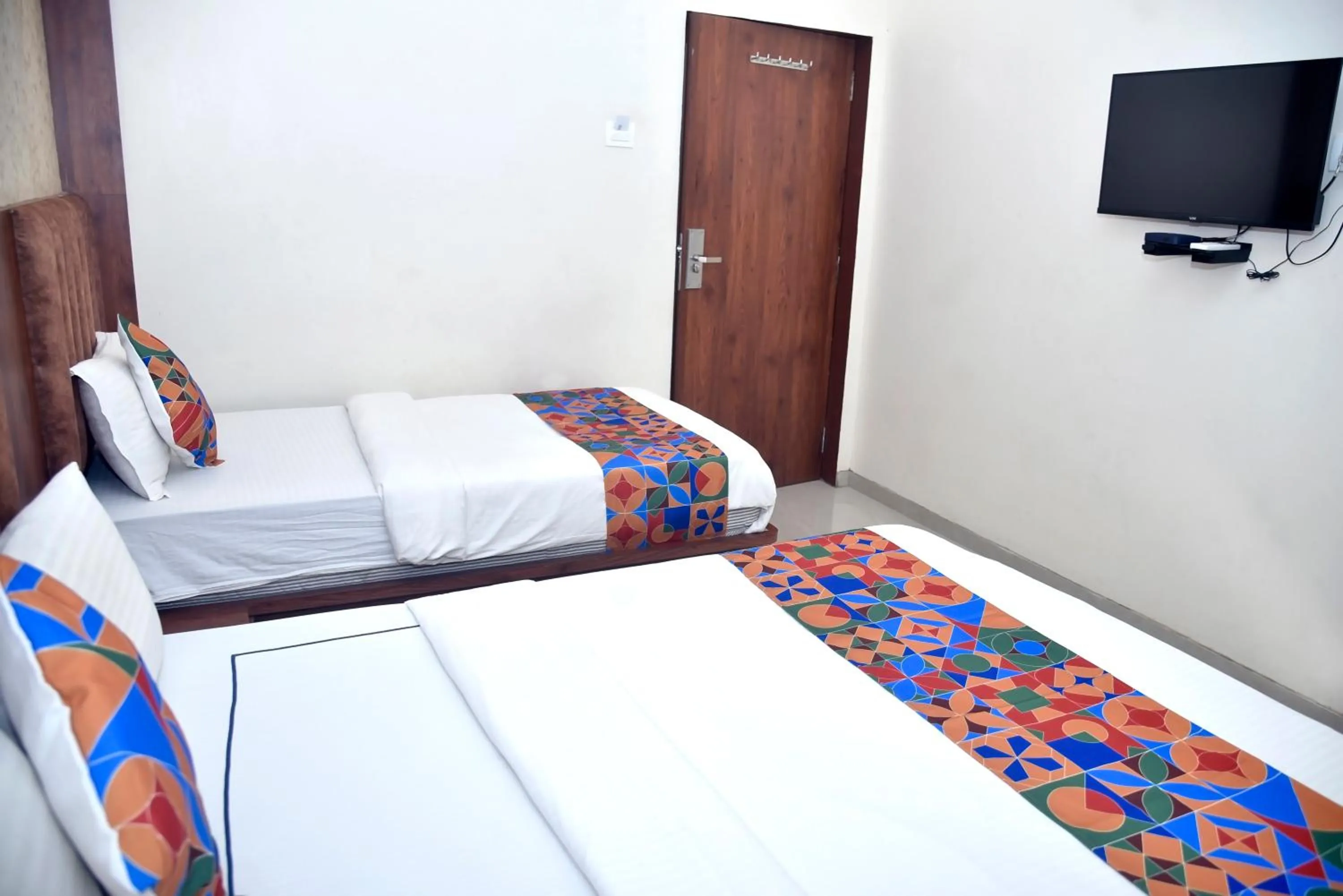 Bedroom in Hotel Pride Inn