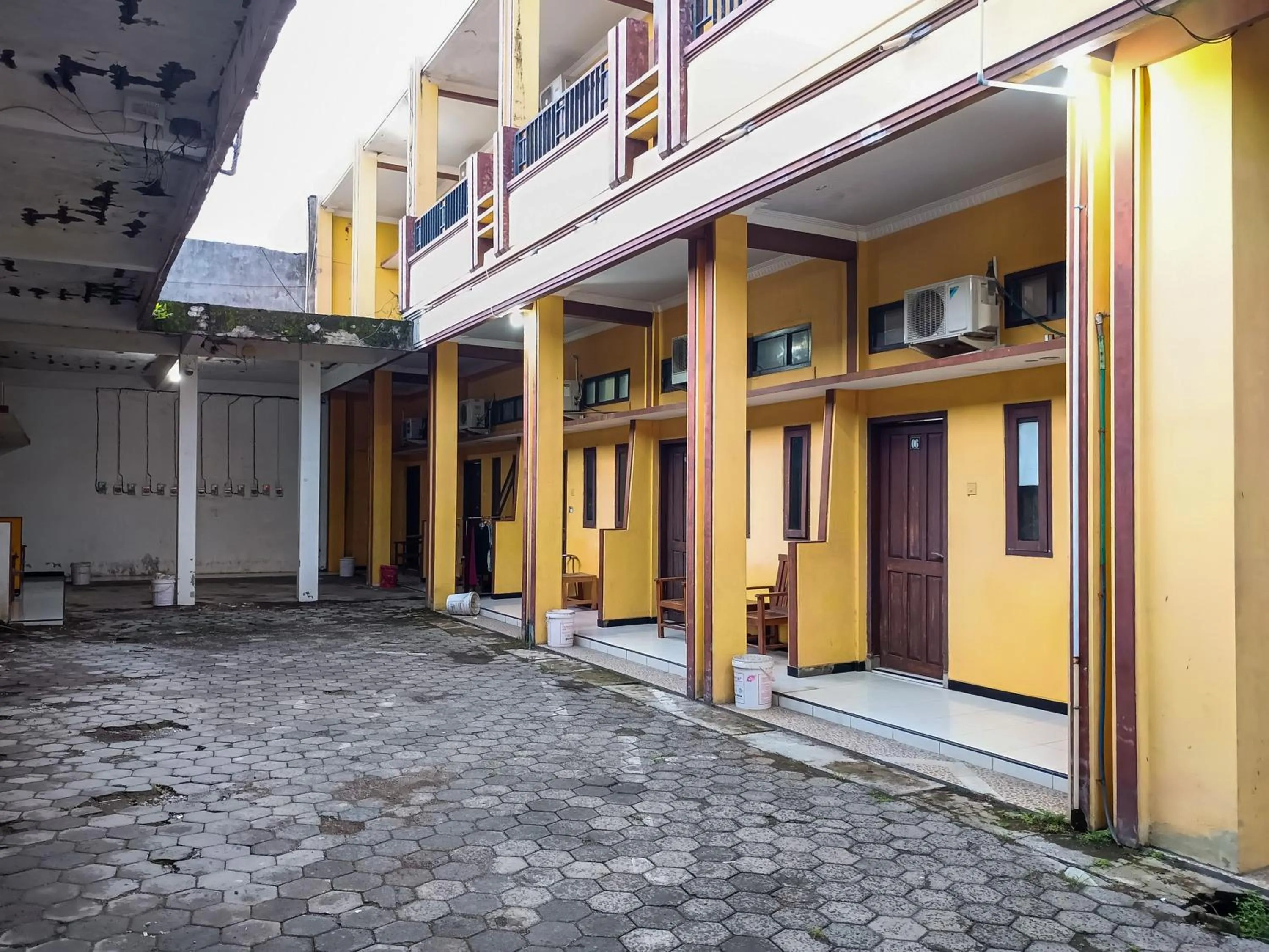 Facade/entrance in RedDoorz at Ratu Homestay Syariah Near Lippo Mall Banyuwangi
