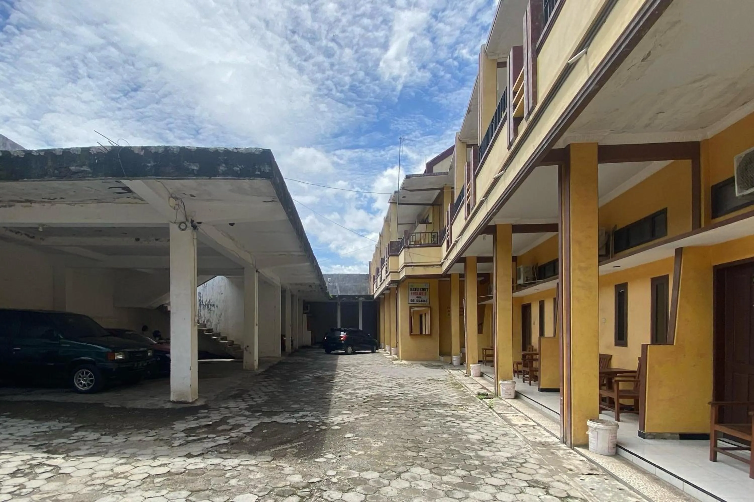 Facade/entrance in RedDoorz at Ratu Homestay Syariah Near Lippo Mall Banyuwangi