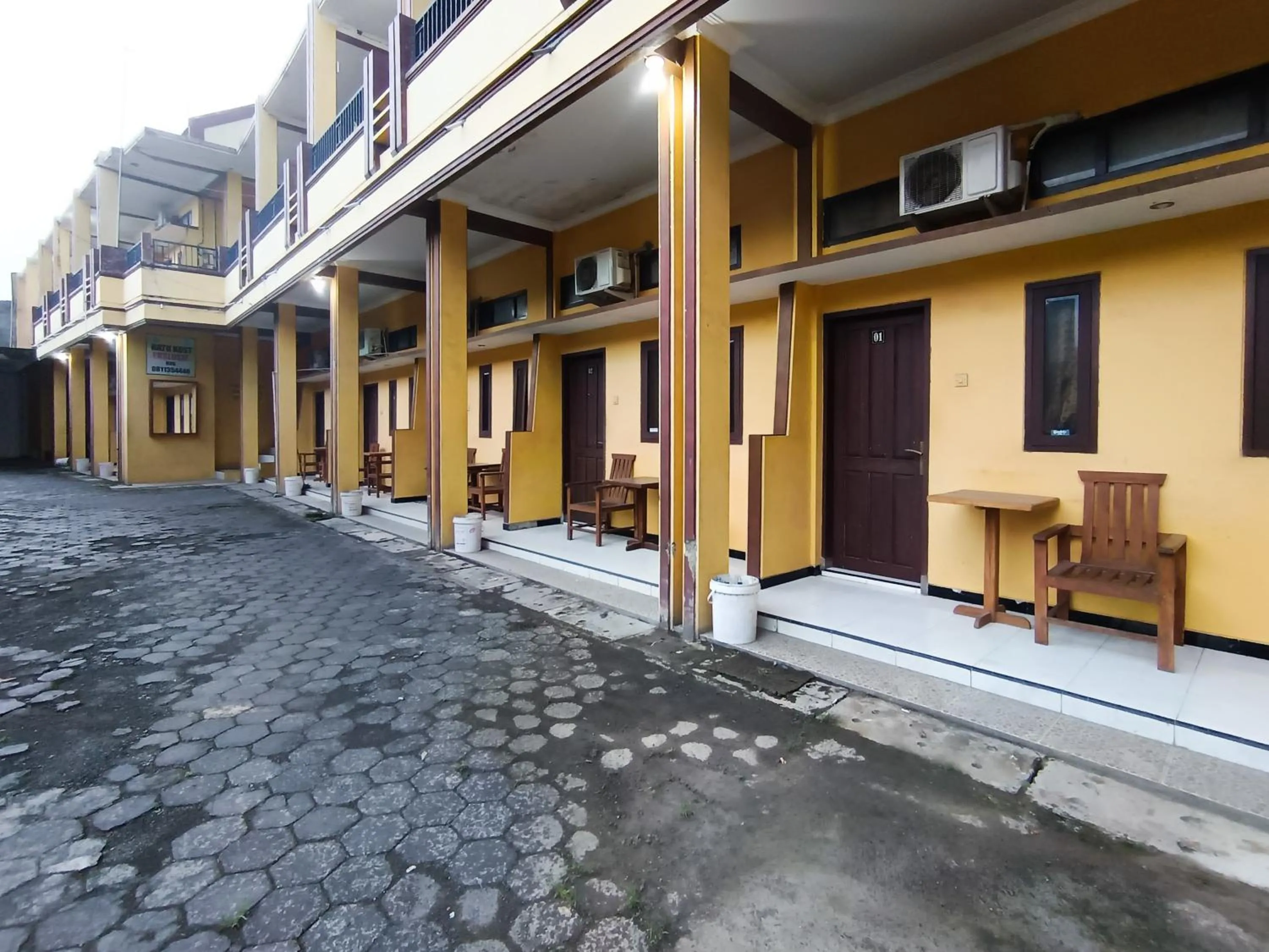 Facade/entrance in RedDoorz at Ratu Homestay Syariah Near Lippo Mall Banyuwangi