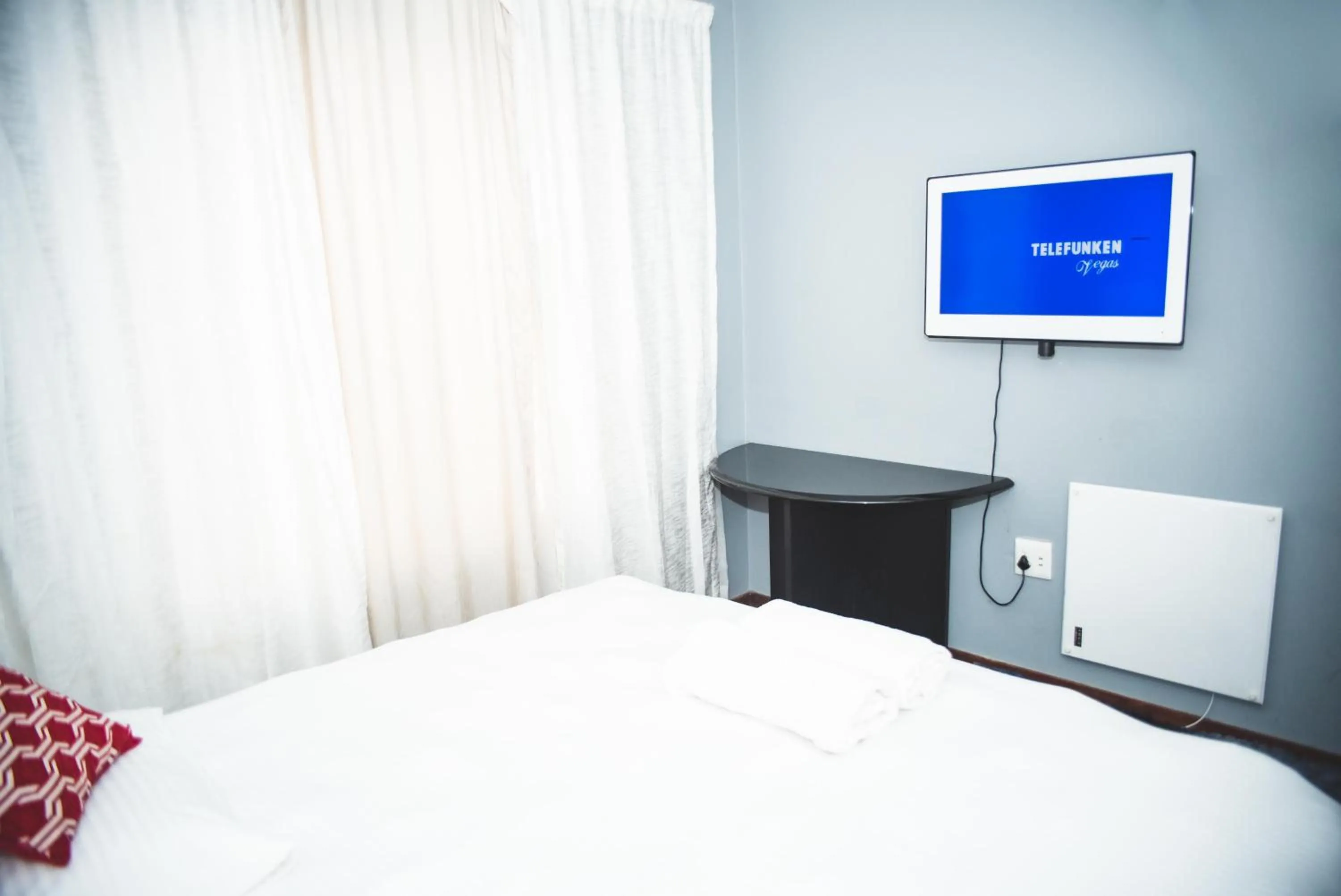 Bed in Reedsview Apartment