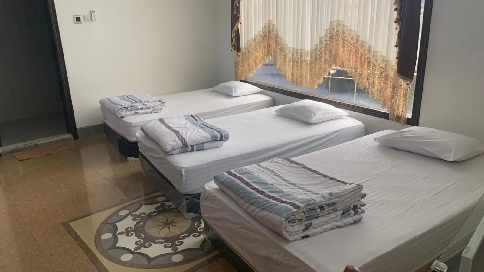 Bed in Hotel Cigadung Holiday syariah