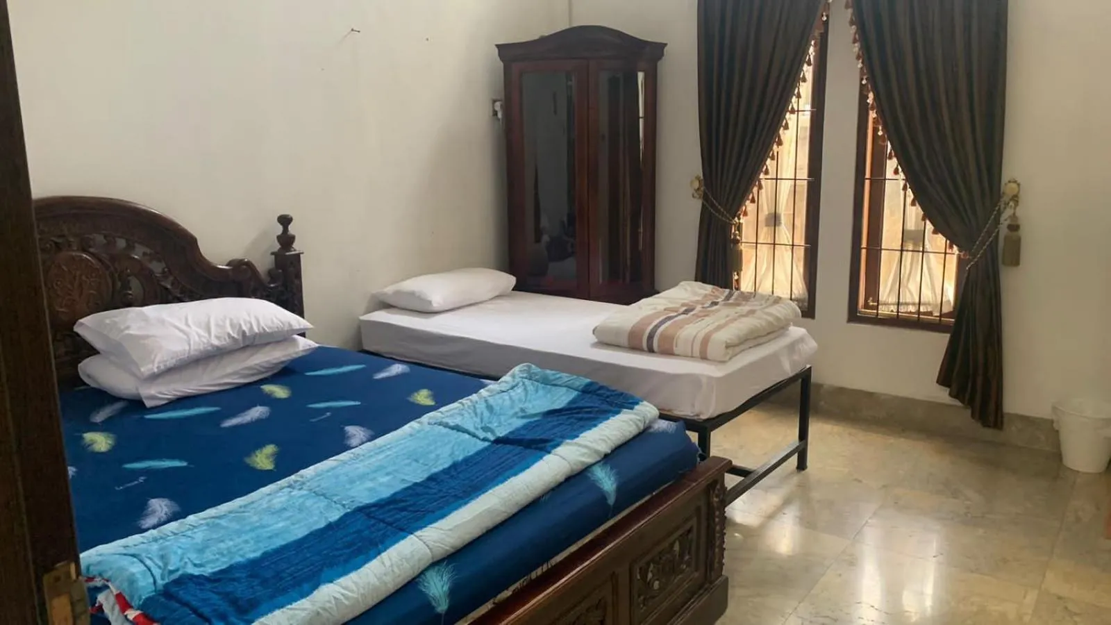 Bed in Hotel Cigadung Holiday syariah