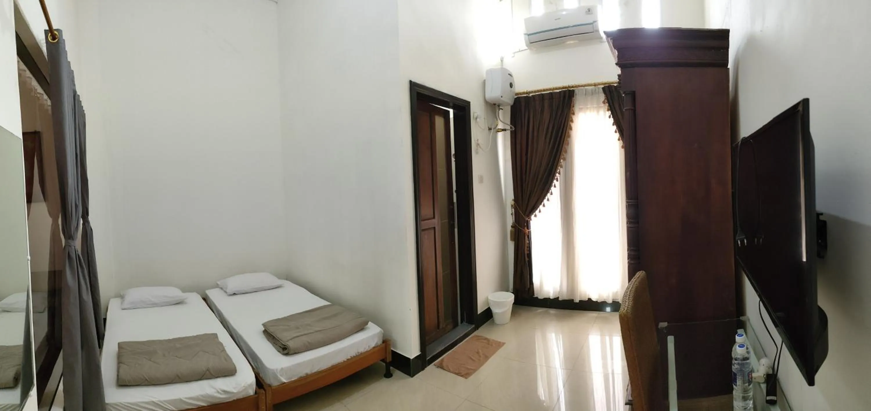 Bed in Hotel Cigadung Holiday syariah