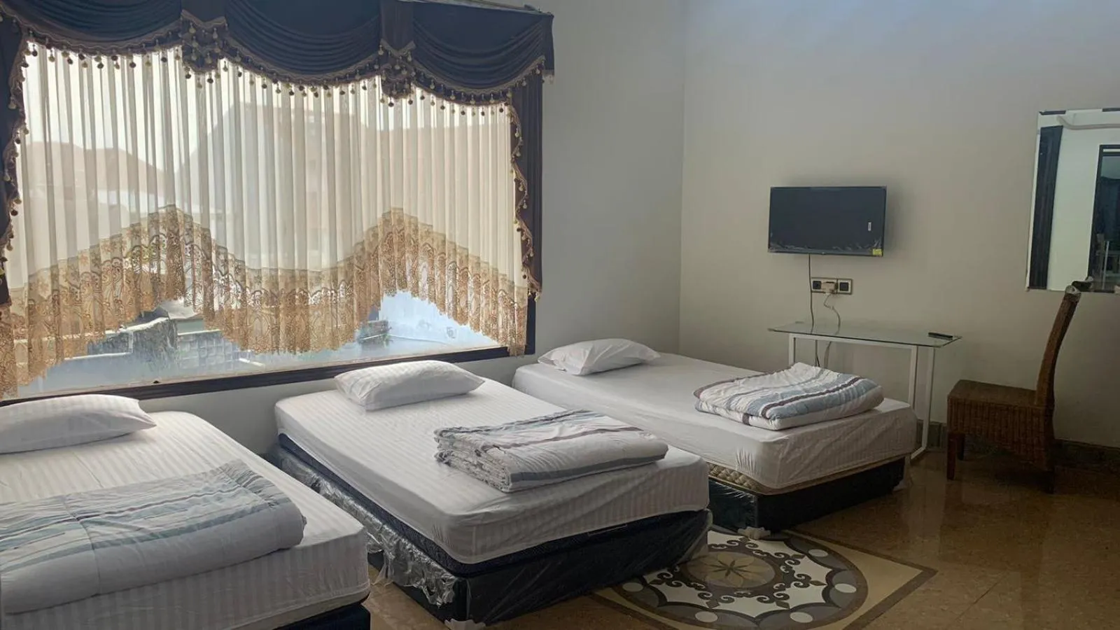 Bed in Hotel Cigadung Holiday syariah