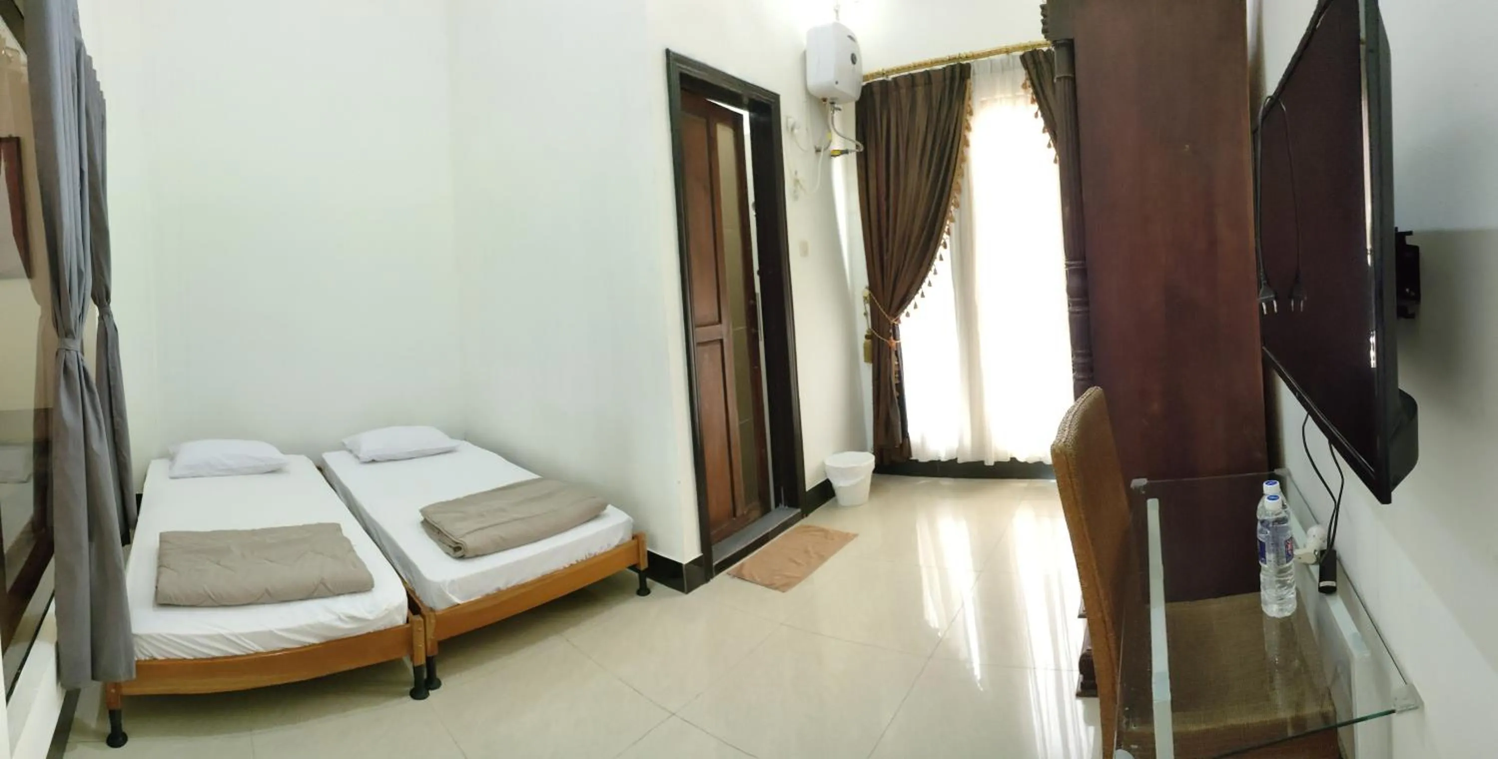 Bed in Hotel Cigadung Holiday syariah