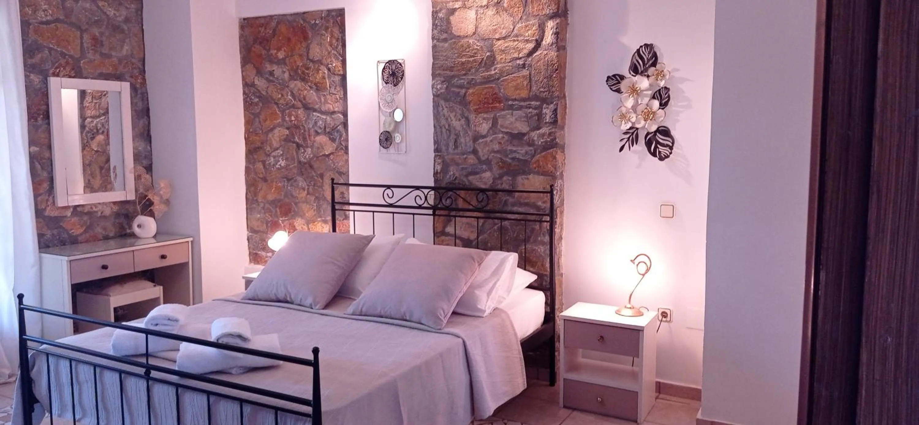 Bed in Elia Village by Irida Iris Group