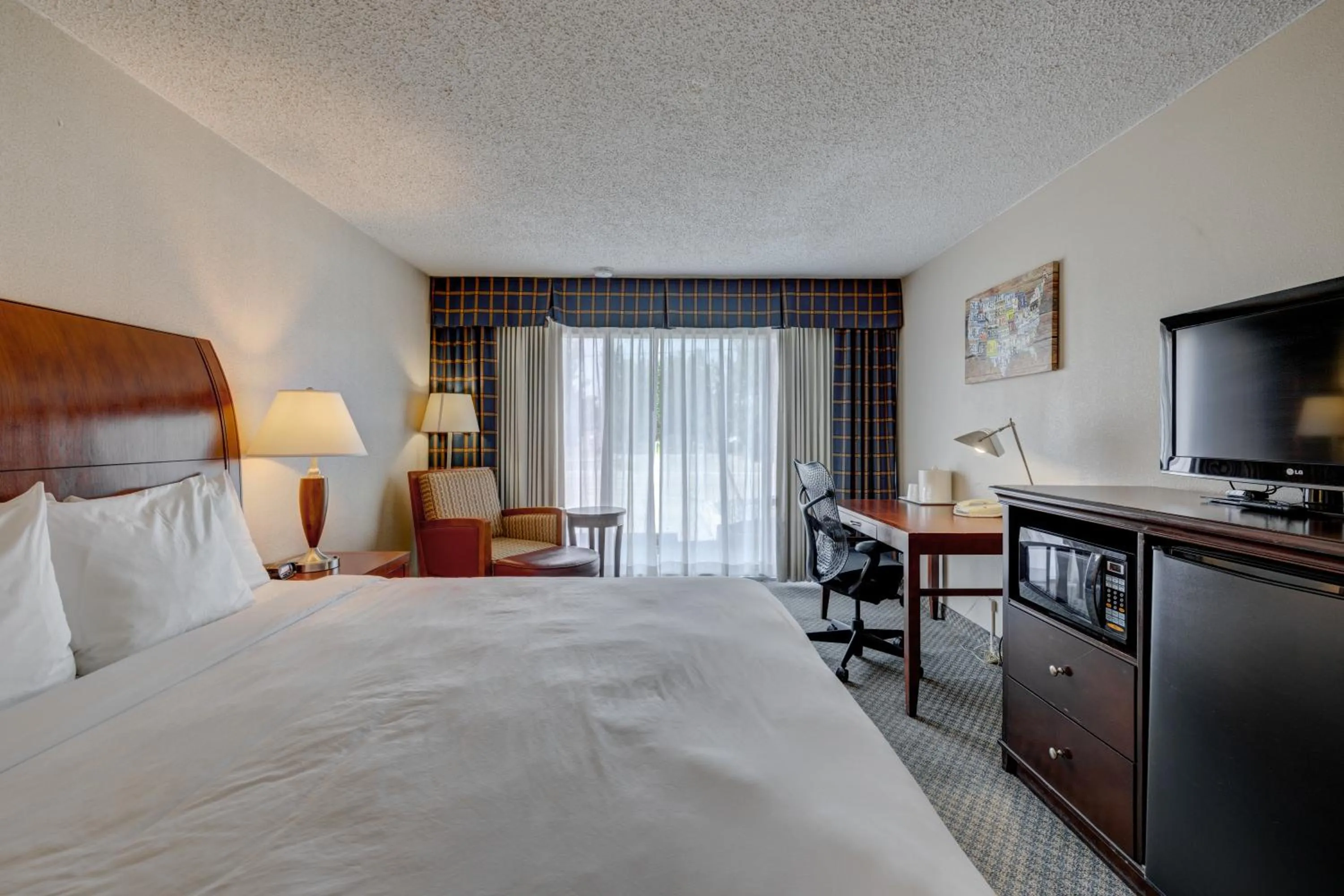 Photo of the whole room, Bed in Riverside Hotel