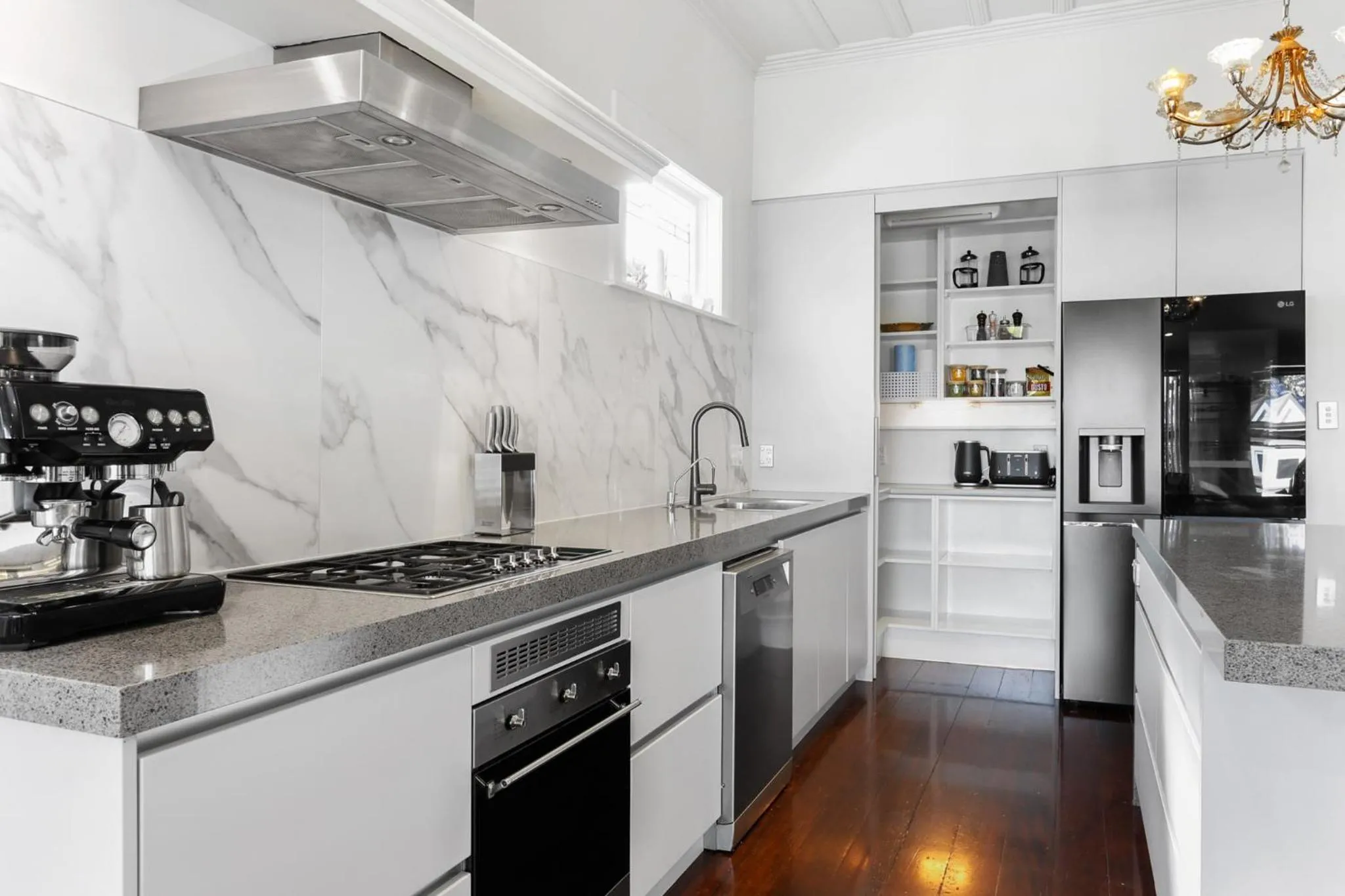 Kitchen or kitchenette in Freemans Bay Home by Urban Rest
