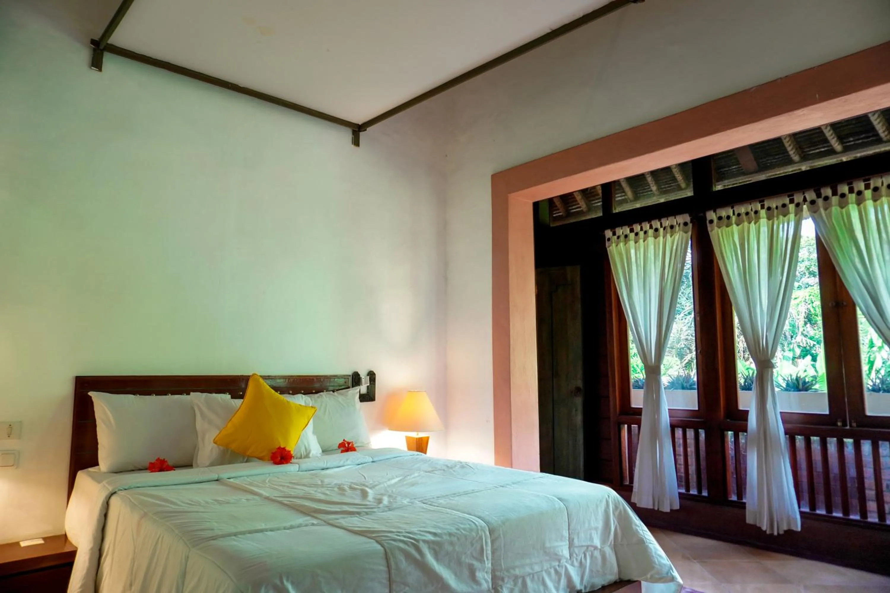 Bed in Alam Puri Art Museum and Villas