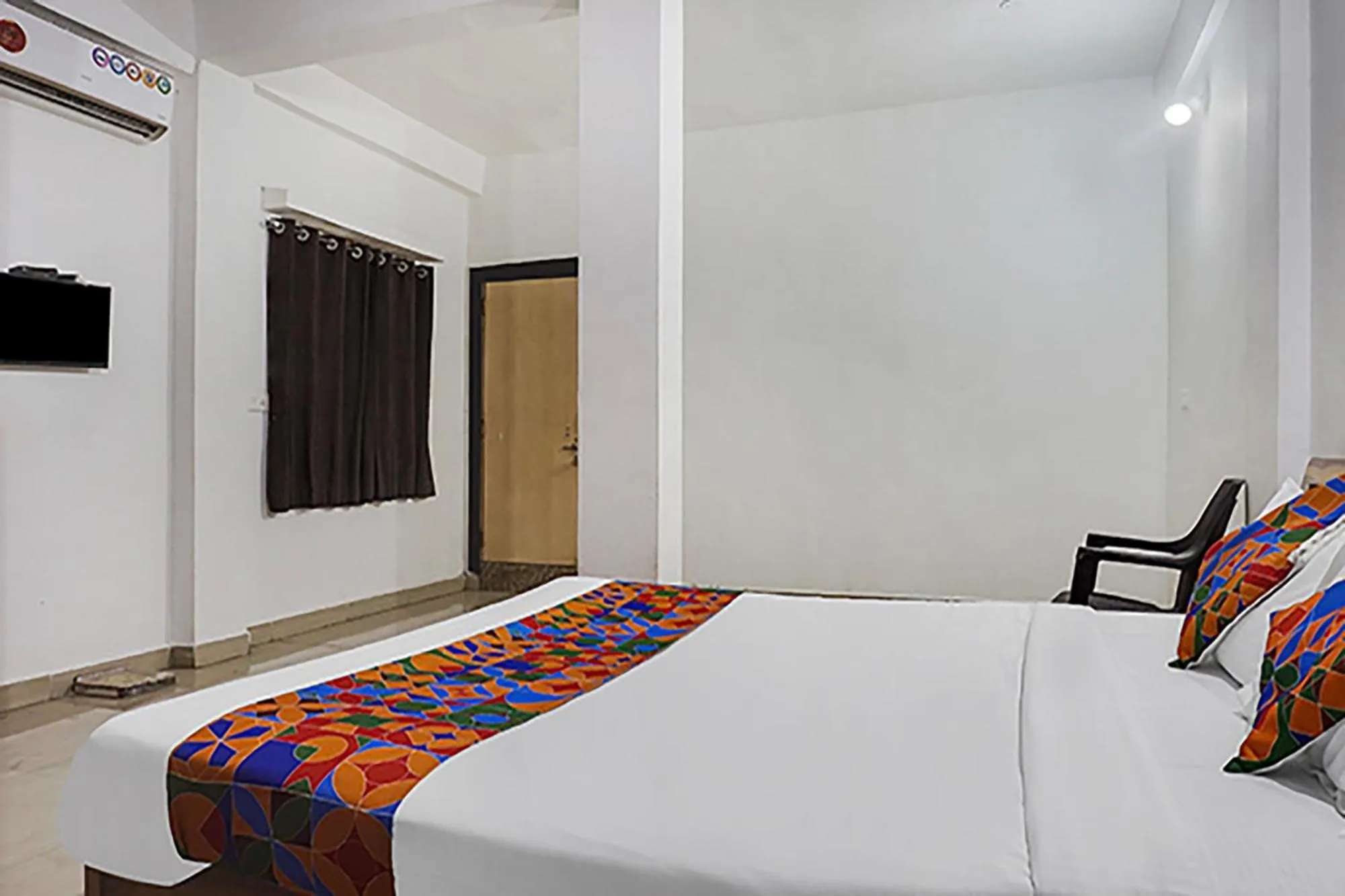 Bed in FabHotel Galaxy Airport Inn, Airport Road