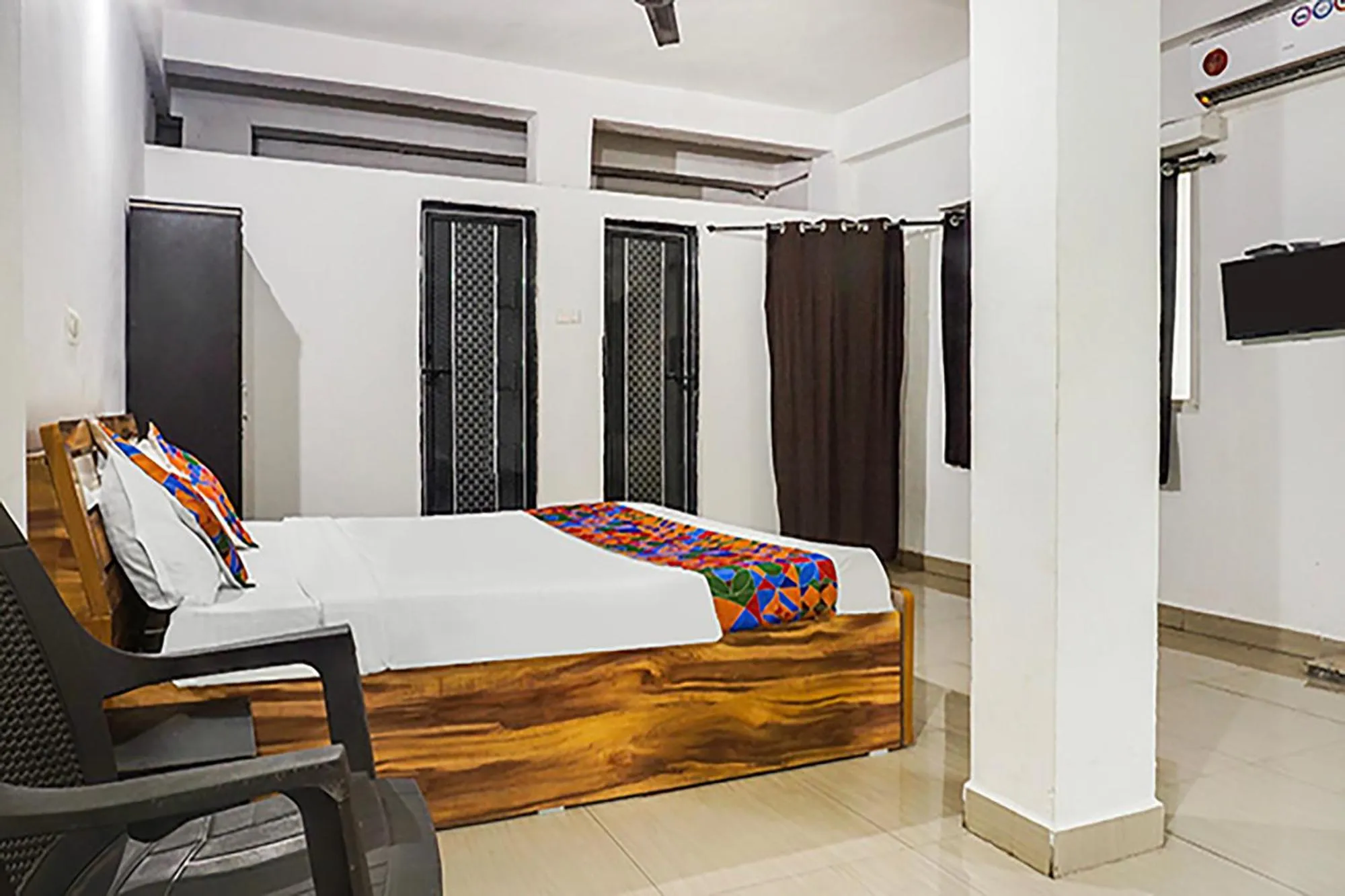 Bed in FabHotel Galaxy Airport Inn, Airport Road