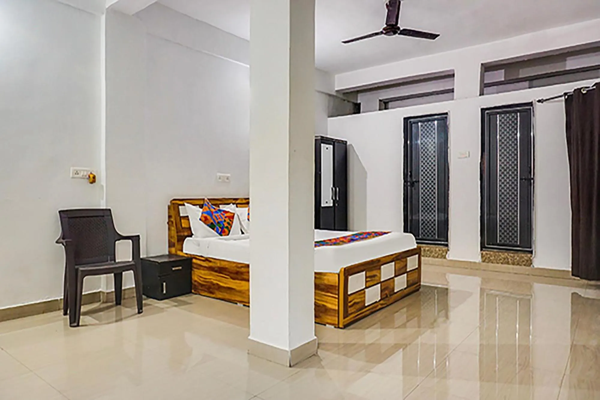 Bed in FabHotel Galaxy Airport Inn, Airport Road