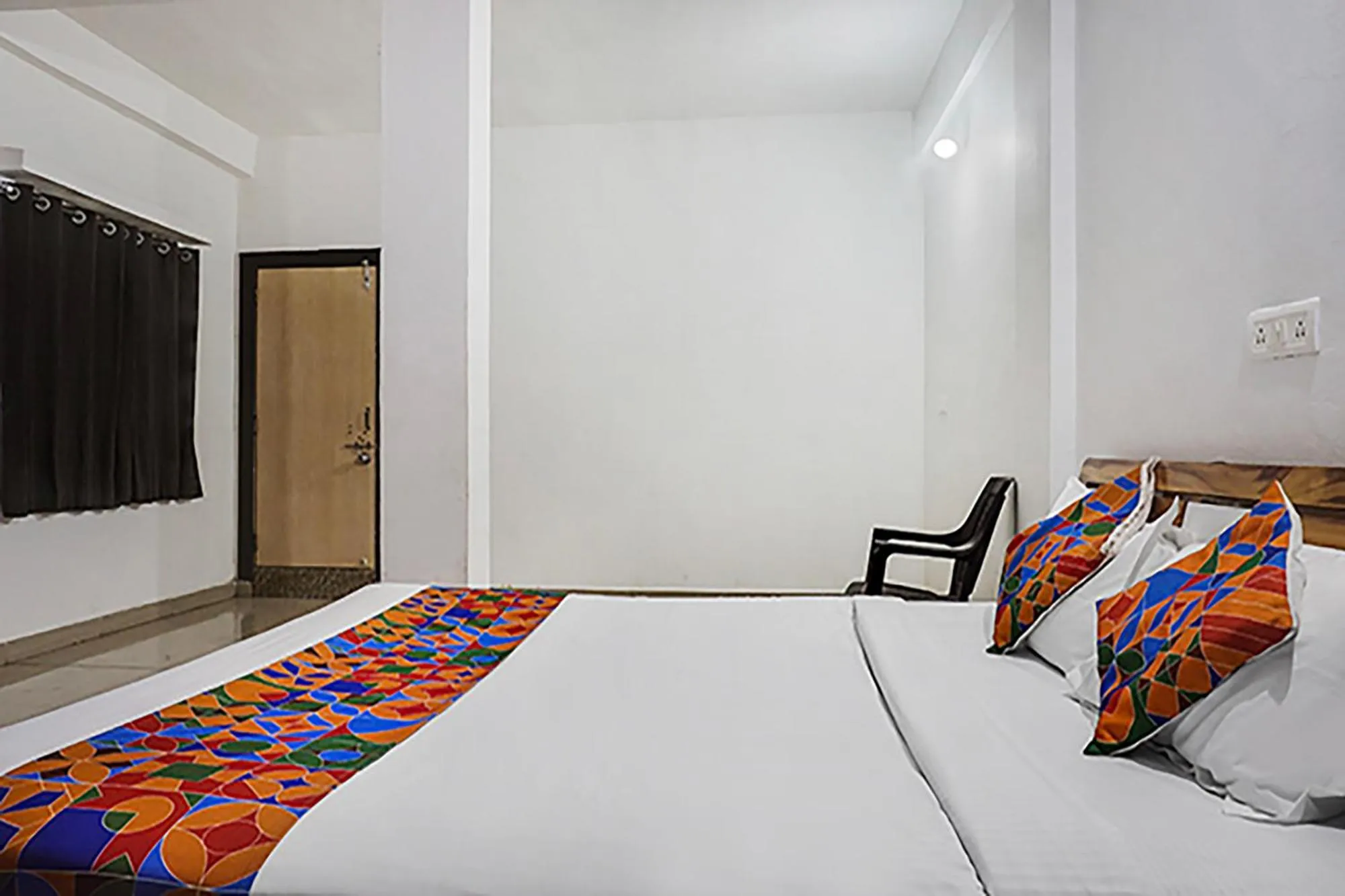 Bed in FabHotel Galaxy Airport Inn, Airport Road