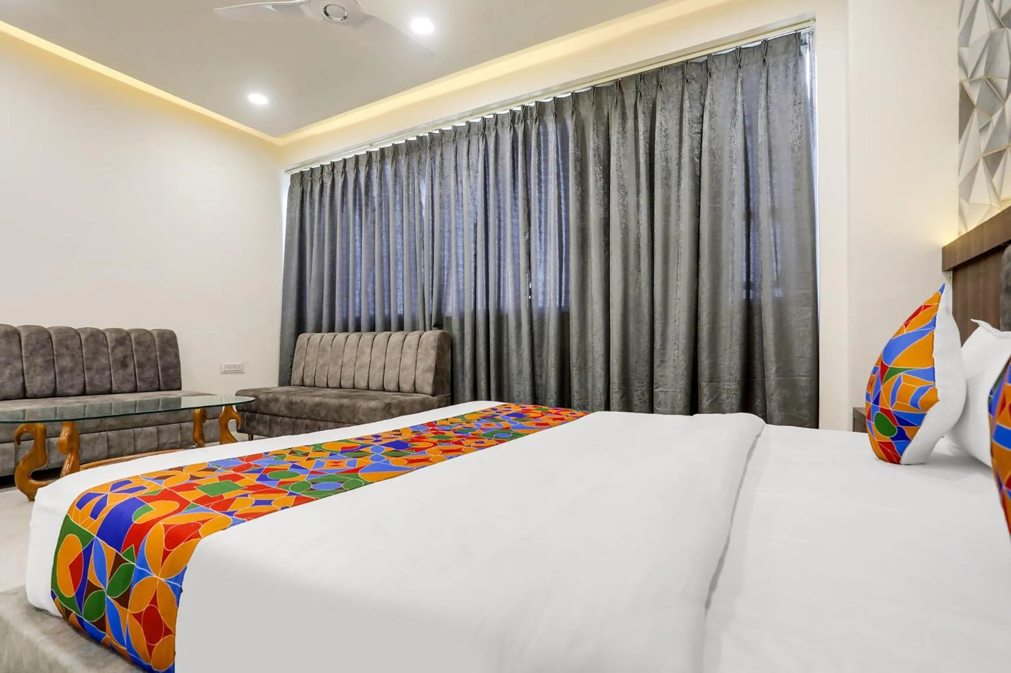Bed in FabHotel Prime Panchwati Regency
