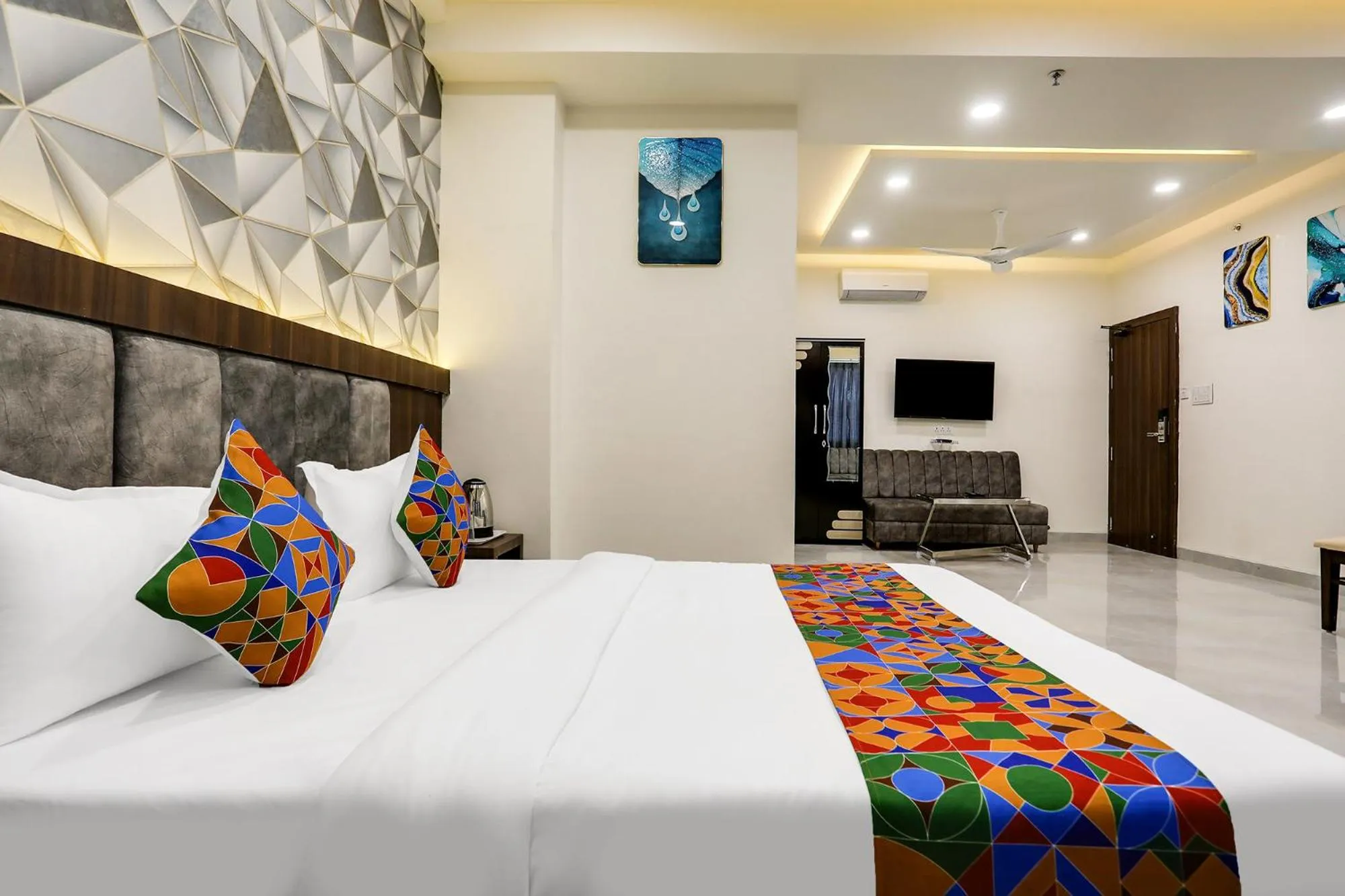 Bed in FabHotel Prime Panchwati Regency