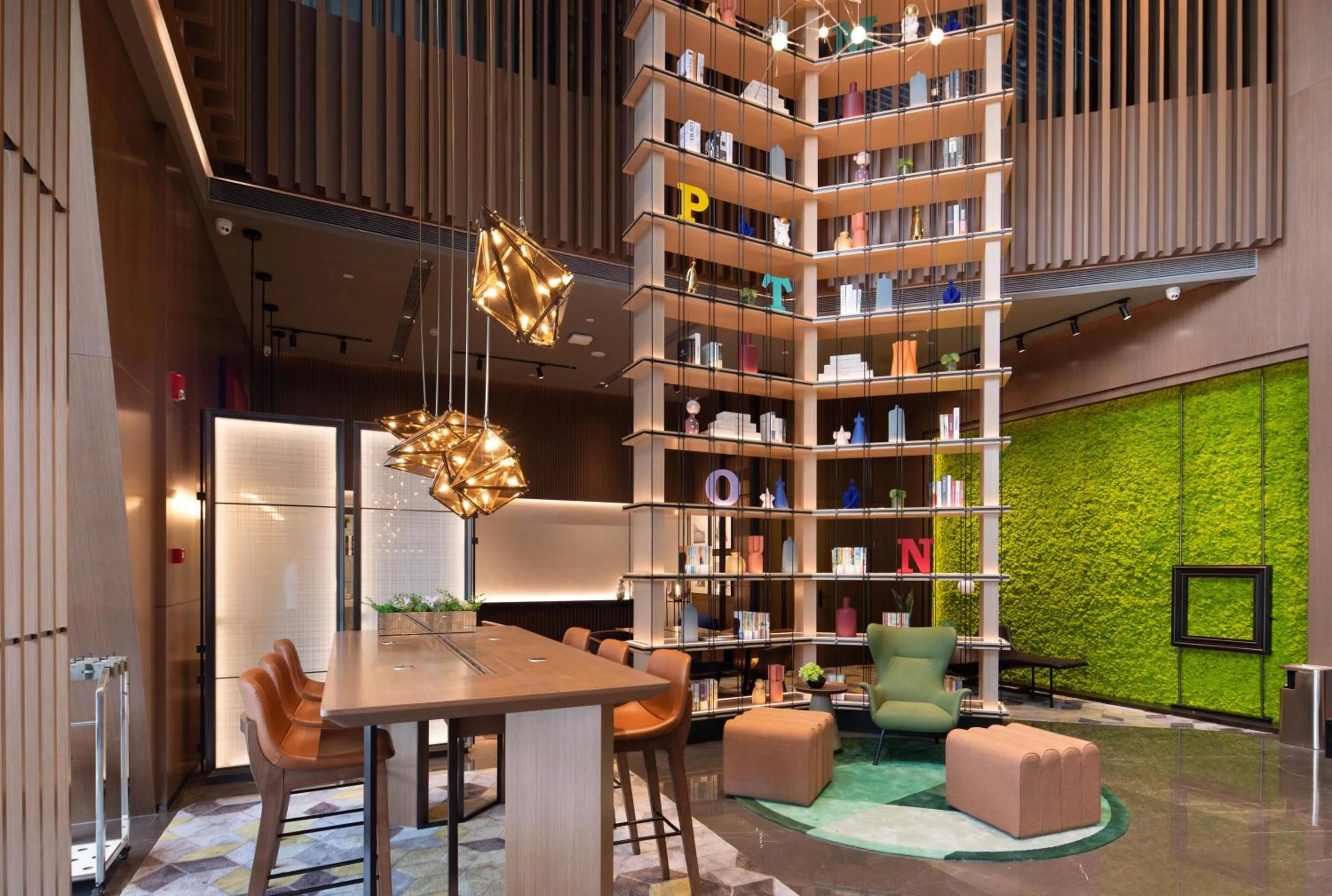 Communal lounge/ TV room in Hilton Hotel by Hampton Wuhan Zhongnan Street Branch