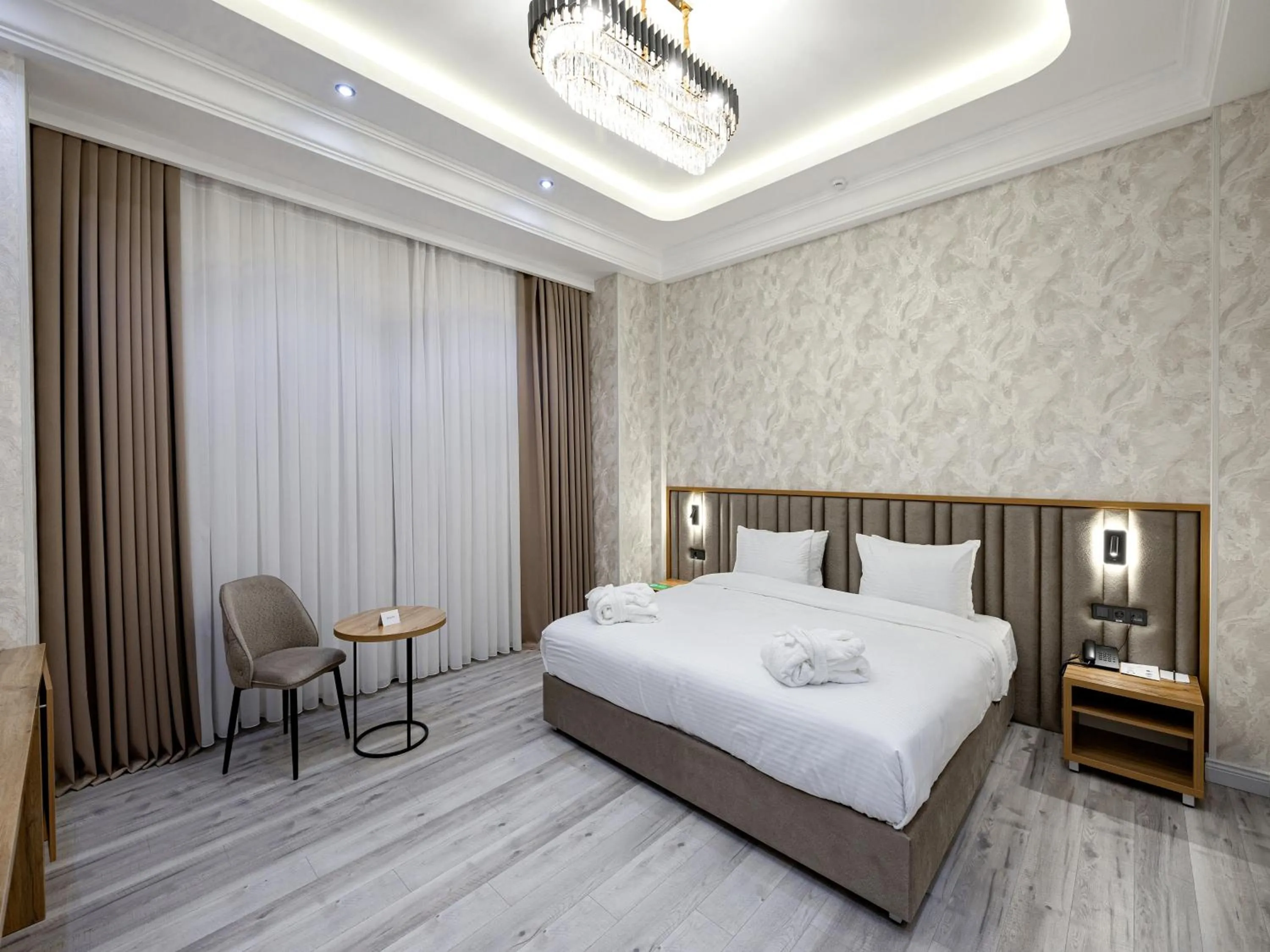 Living room, Bed in Baden-Baden Hotel Tashkent