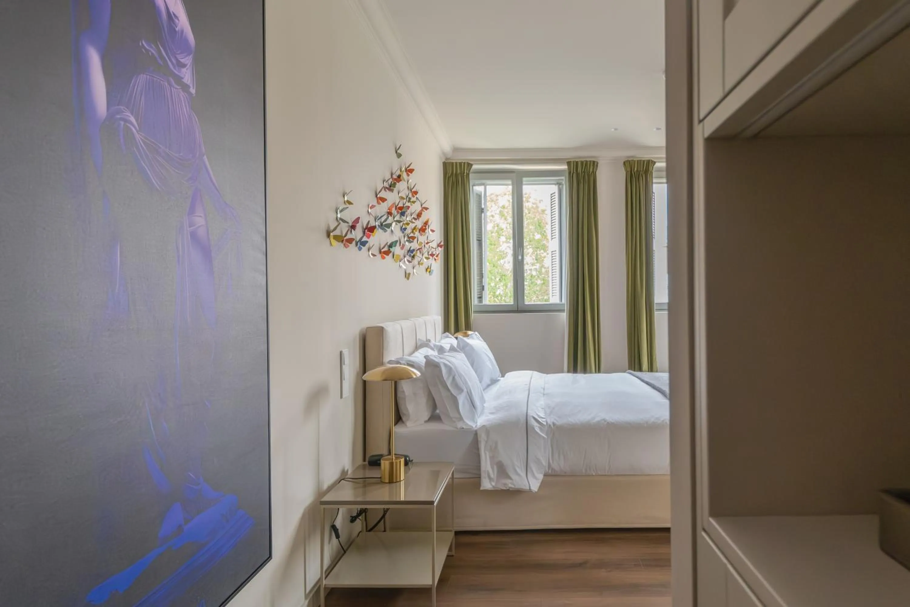 Bed in Nine Athens Hotel