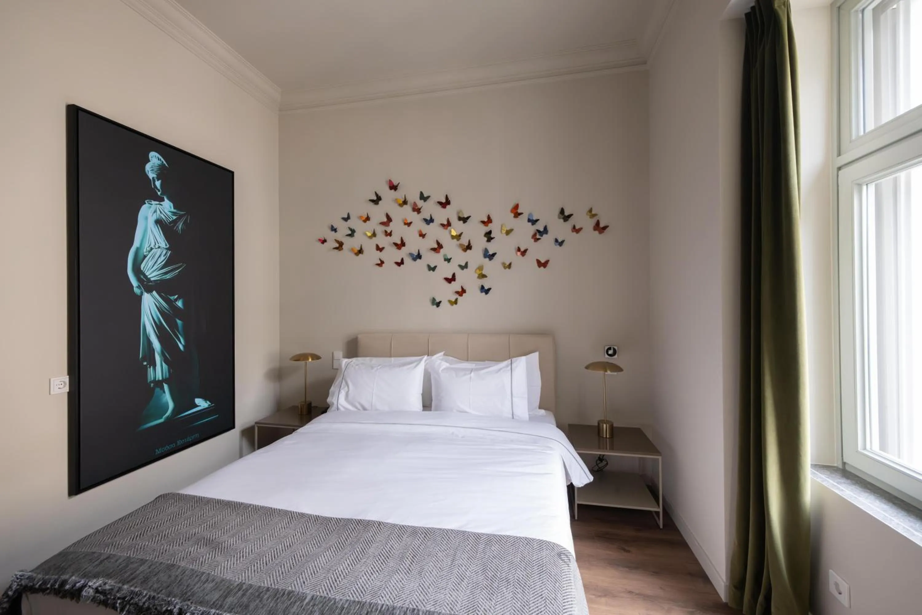 Bed in Nine Athens Hotel