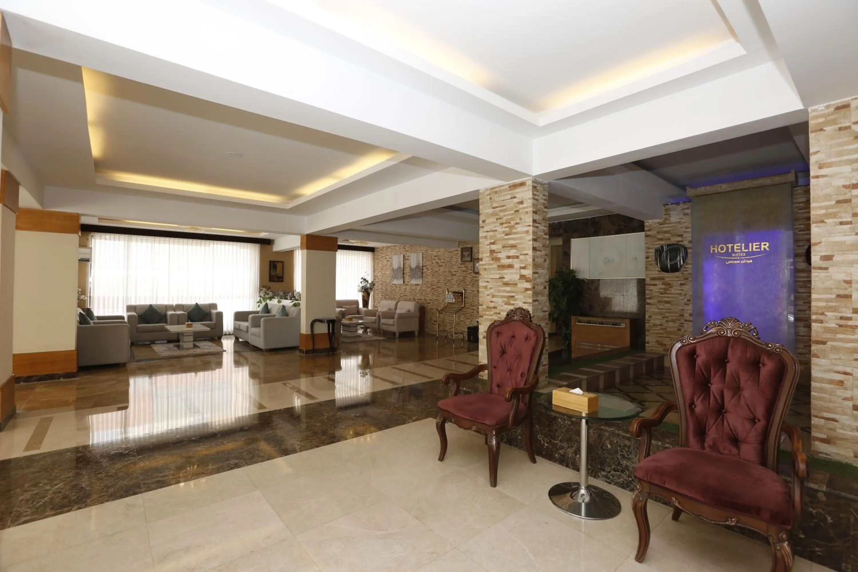 Lobby or reception in Hotelier Suites by Cantonal