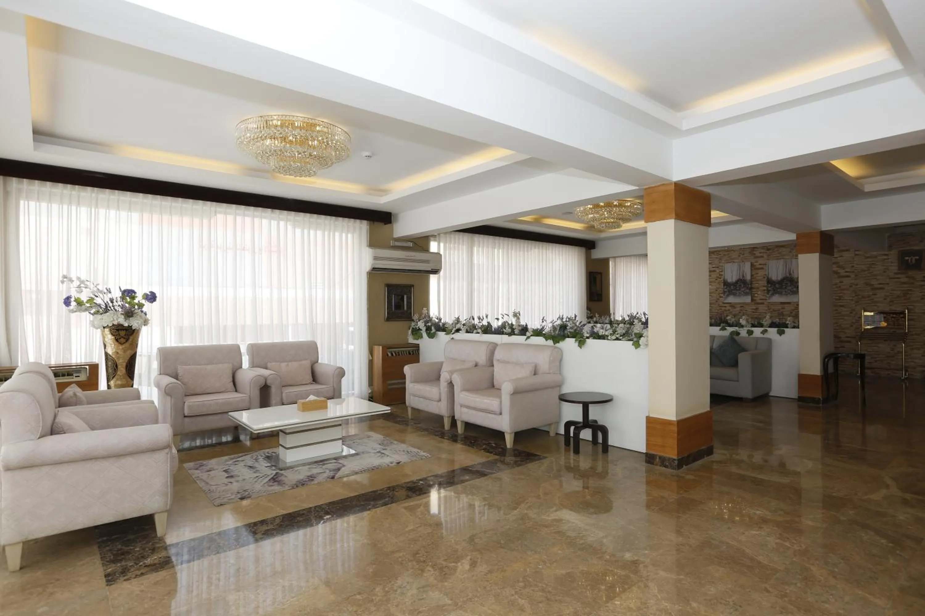 Seating area in Hotelier Suites by Cantonal