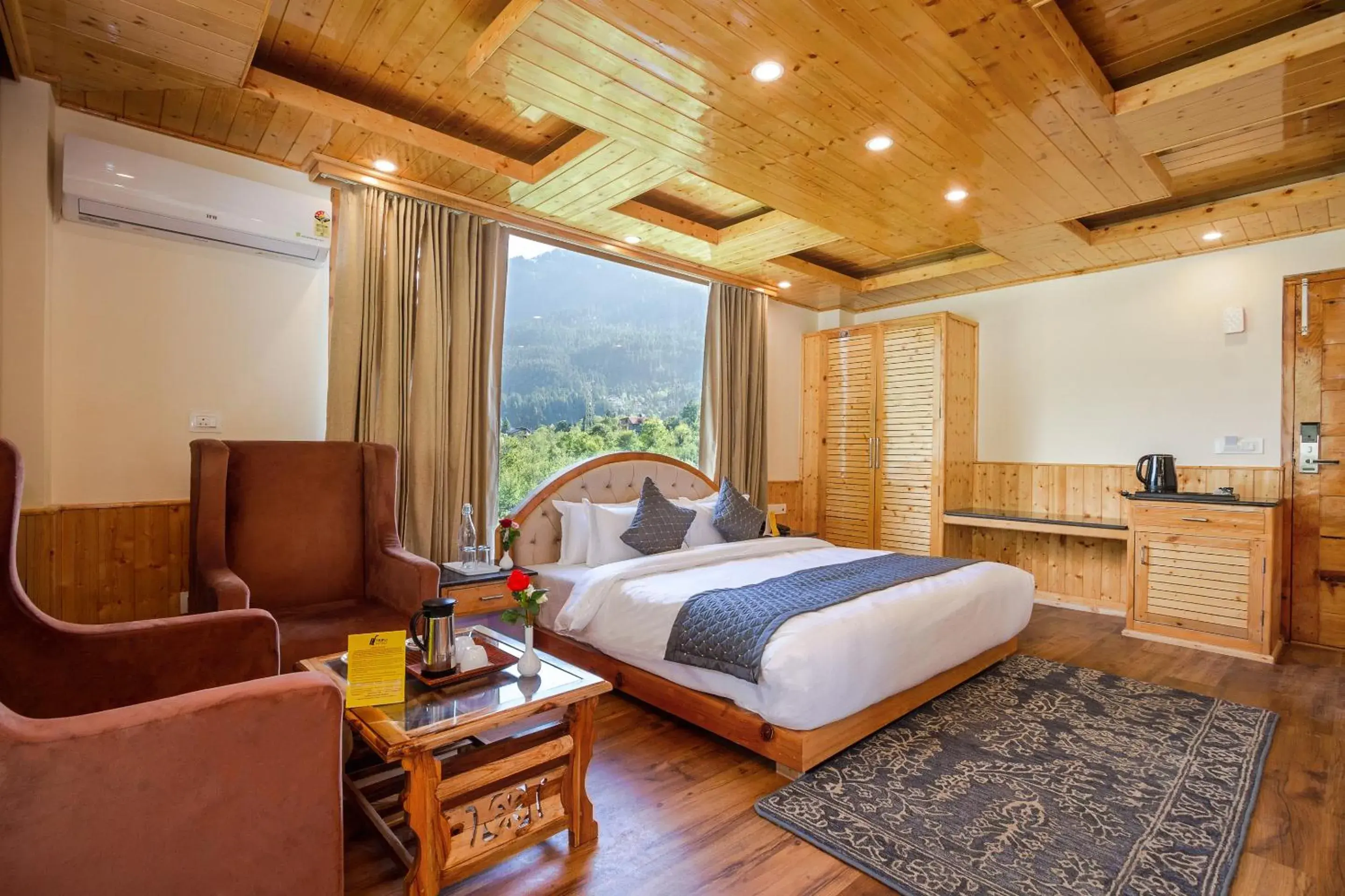 TV and multimedia, Bed in Tripli Hotels Namaste Manali TV and multimedia, Bed in Tripli Hotels Namaste Manali