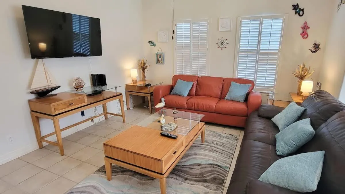 Living room in Beach & Palms condo