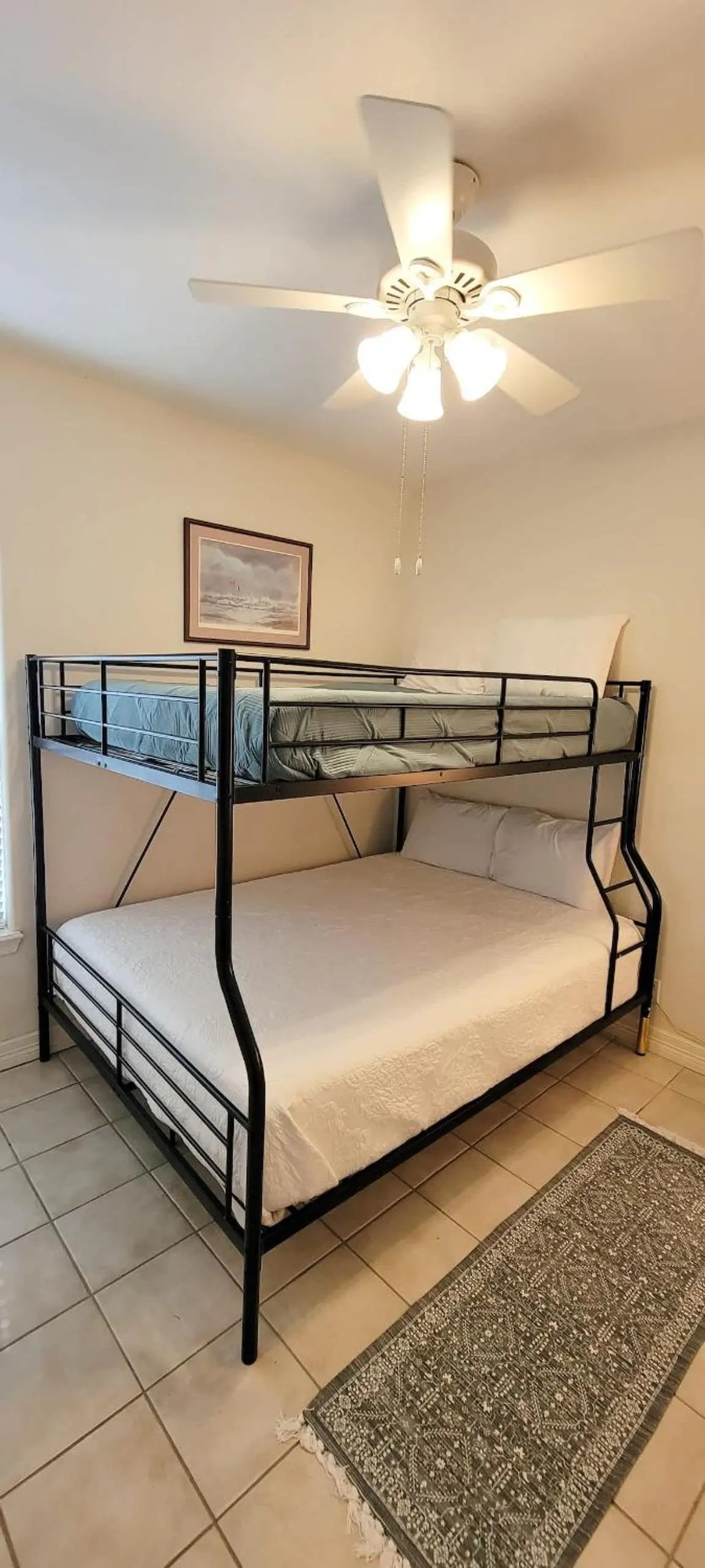 Bed in Beach & Palms condo
