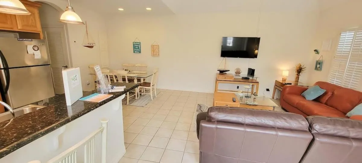 Living room in Beach & Palms condo