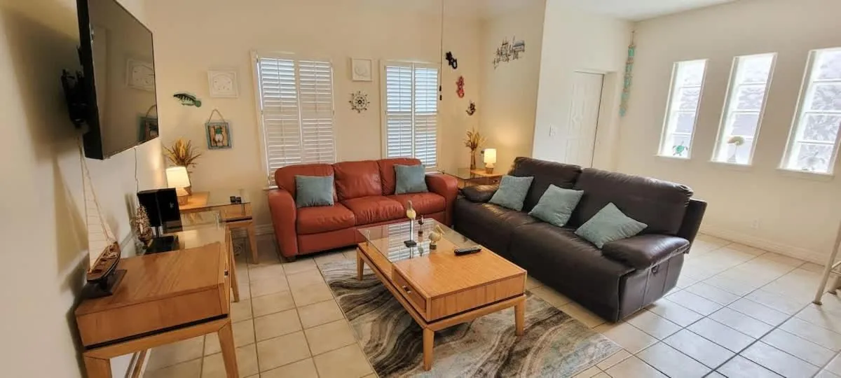 Living room in Beach & Palms condo