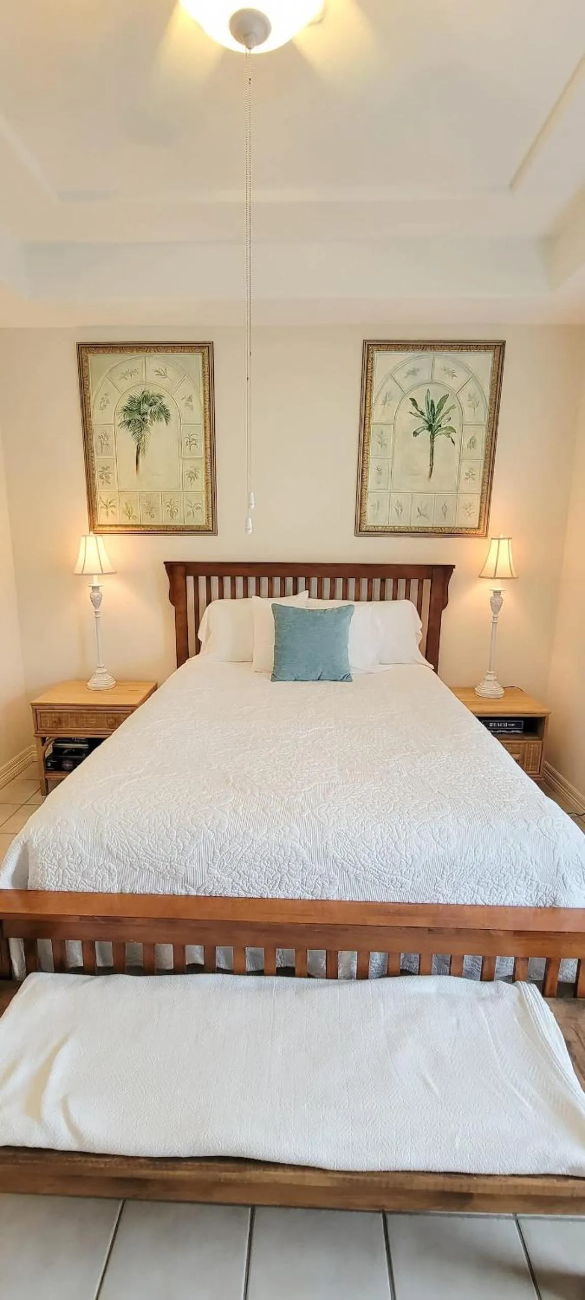 Bed in Beach & Palms condo