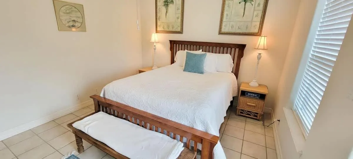 Bed in Beach & Palms condo