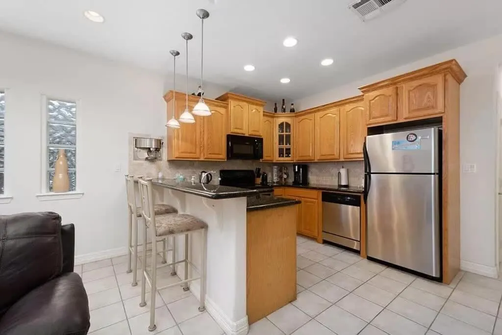Kitchen or kitchenette in Beach & Palms condo