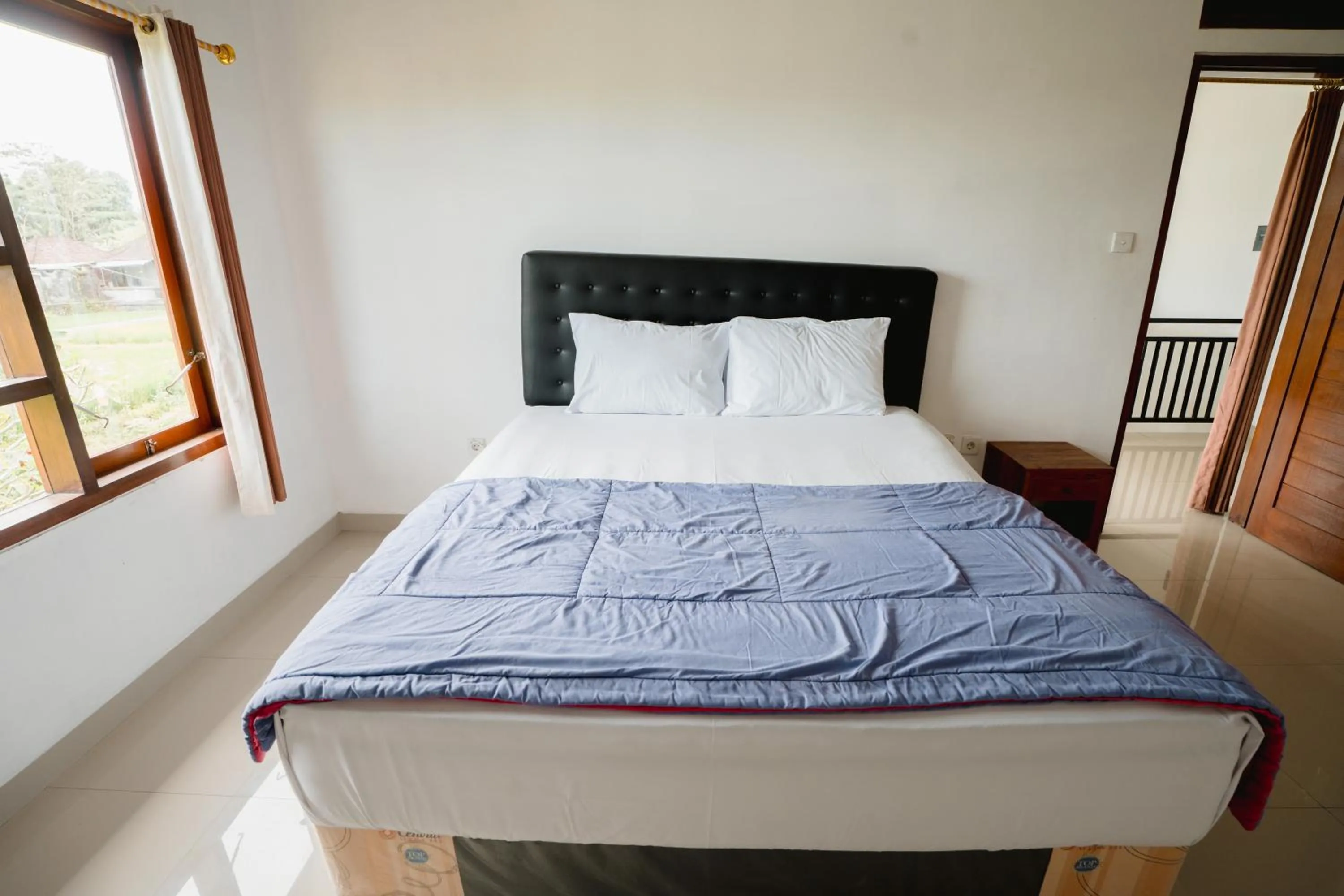 Bed in Casa De Arya Ubud