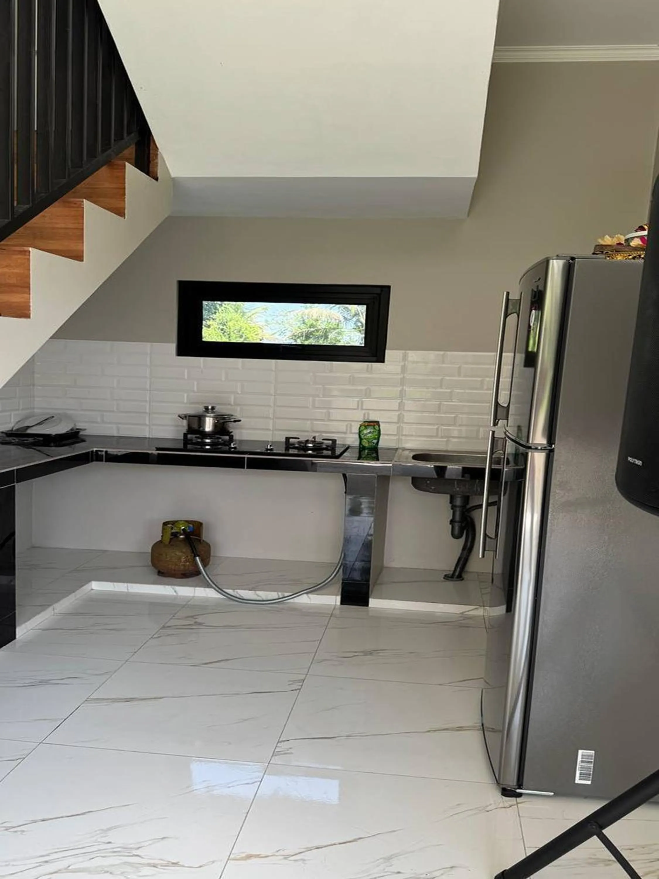 Kitchen or kitchenette in Casa De Arya Ubud