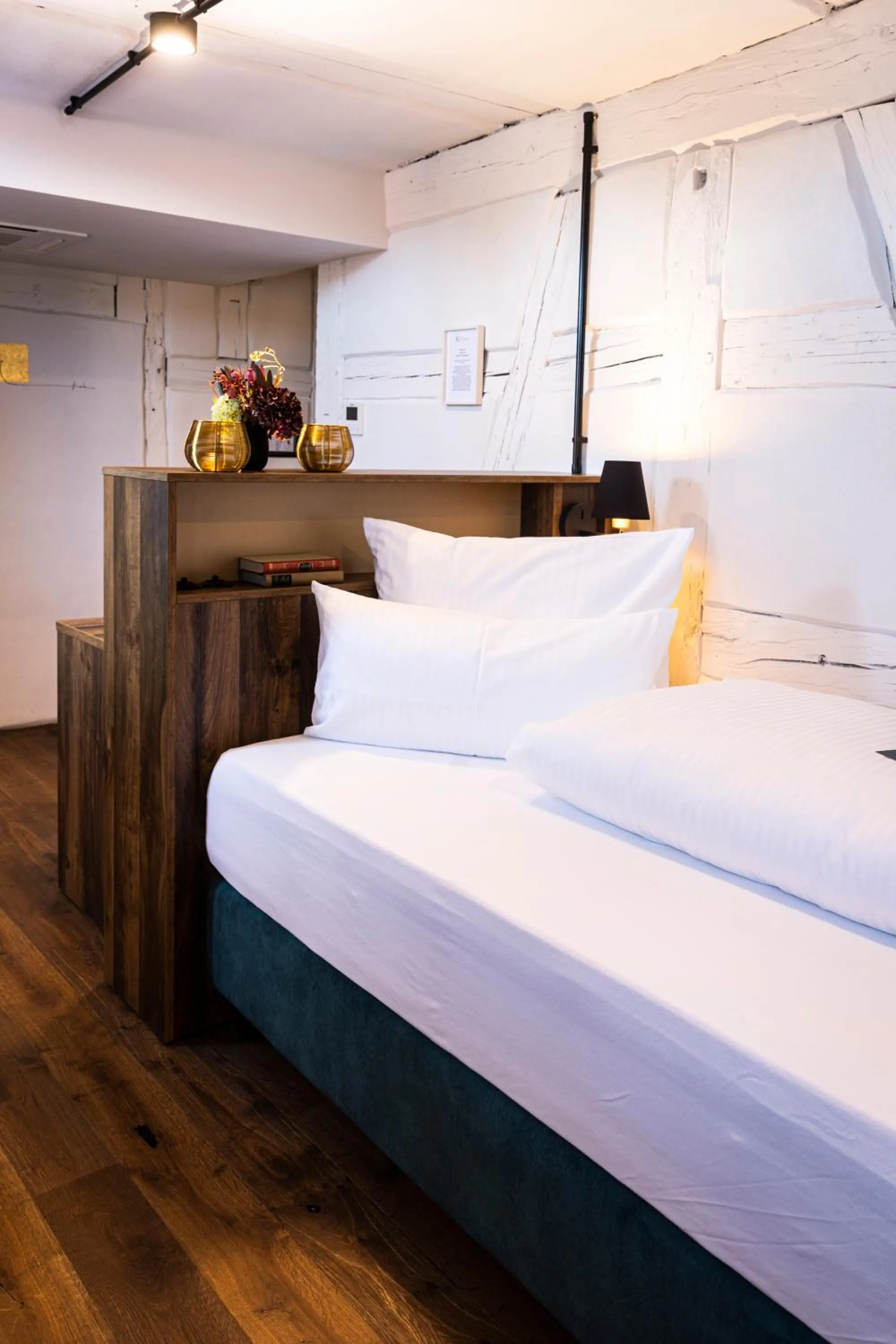 Bed in Das Goldschläger Boutique Hotel
