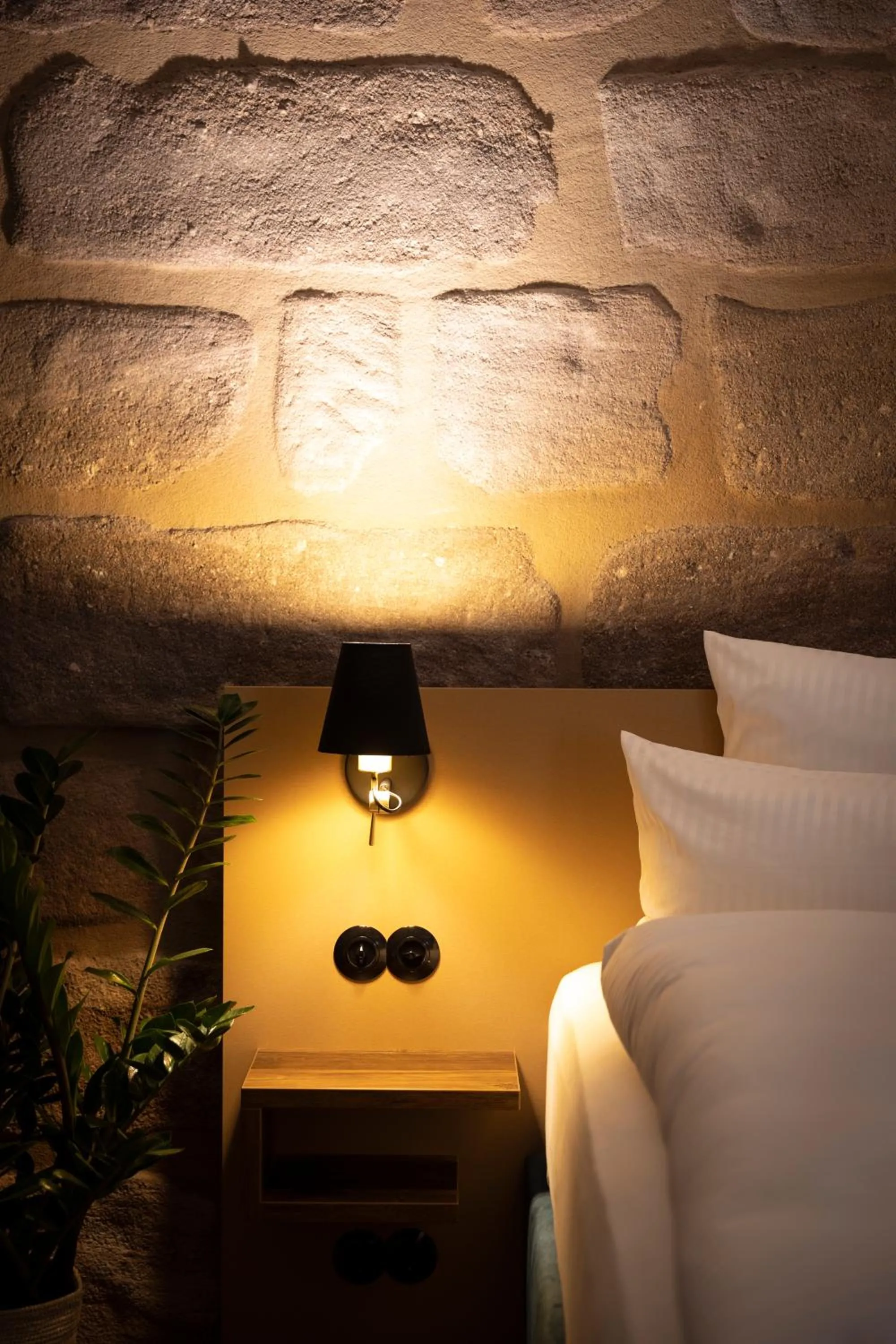 Bed in Das Goldschläger Boutique Hotel