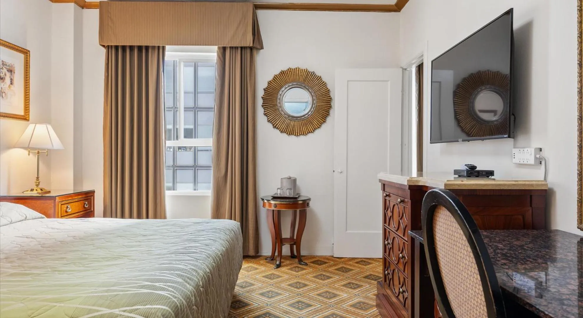 Bed in EMBASSY HOTEL