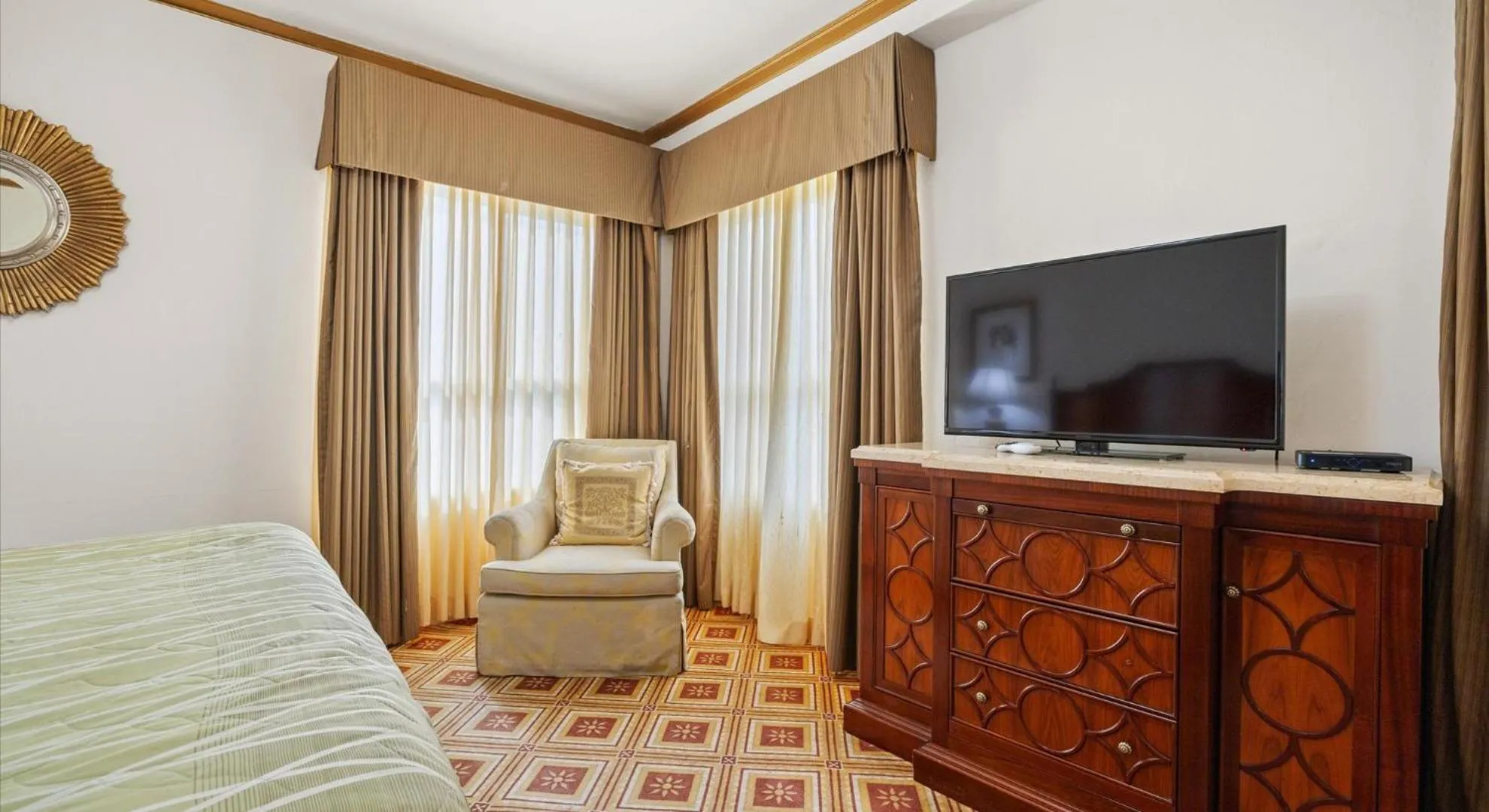 Bed in EMBASSY HOTEL