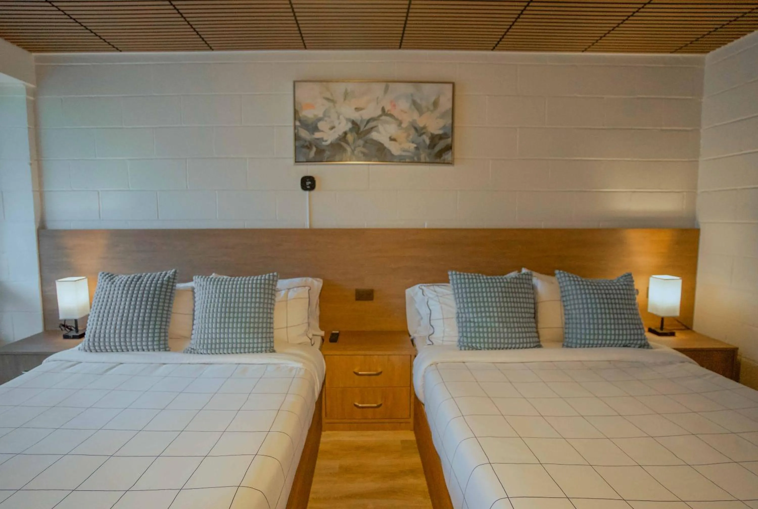 Bed in Stay Inn Muskoka